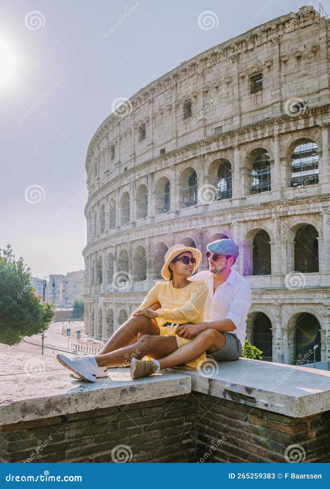 couple visit the colosseum in rome at a citytrip in rome italy, europe