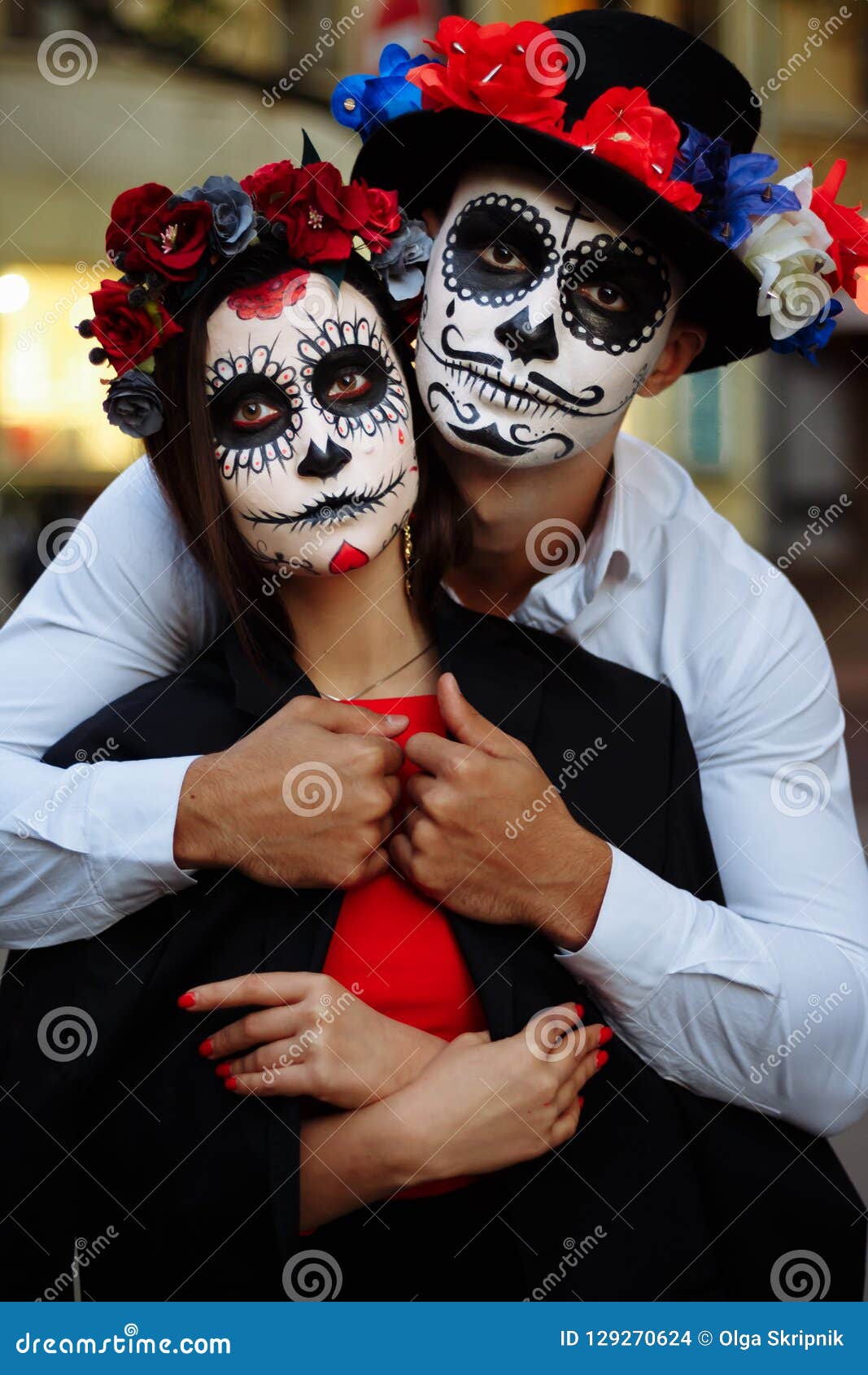 A Couple, Wearing Skull Make-up for. All Souls Day. Boy and Girl Sugar Skull Makeup.painted for Halloween Standing on the Street Stock Photo - Image of bouquet, couple: 129270624 A Couple, Wearing Skull Make-Up For. All Souls Day. Boy And Girl Sugar Skull Makeup.Painted For Halloween Standing On The Street Stock Photo - Image Of Bouquet, Couple: 129270624