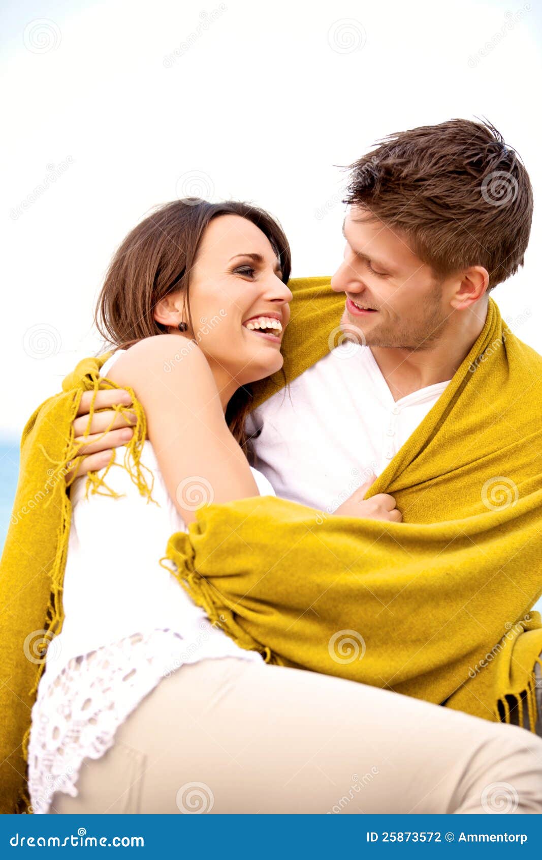 Couple Wrapped in Blanket Looking at Each Other Stock Photo Image of
