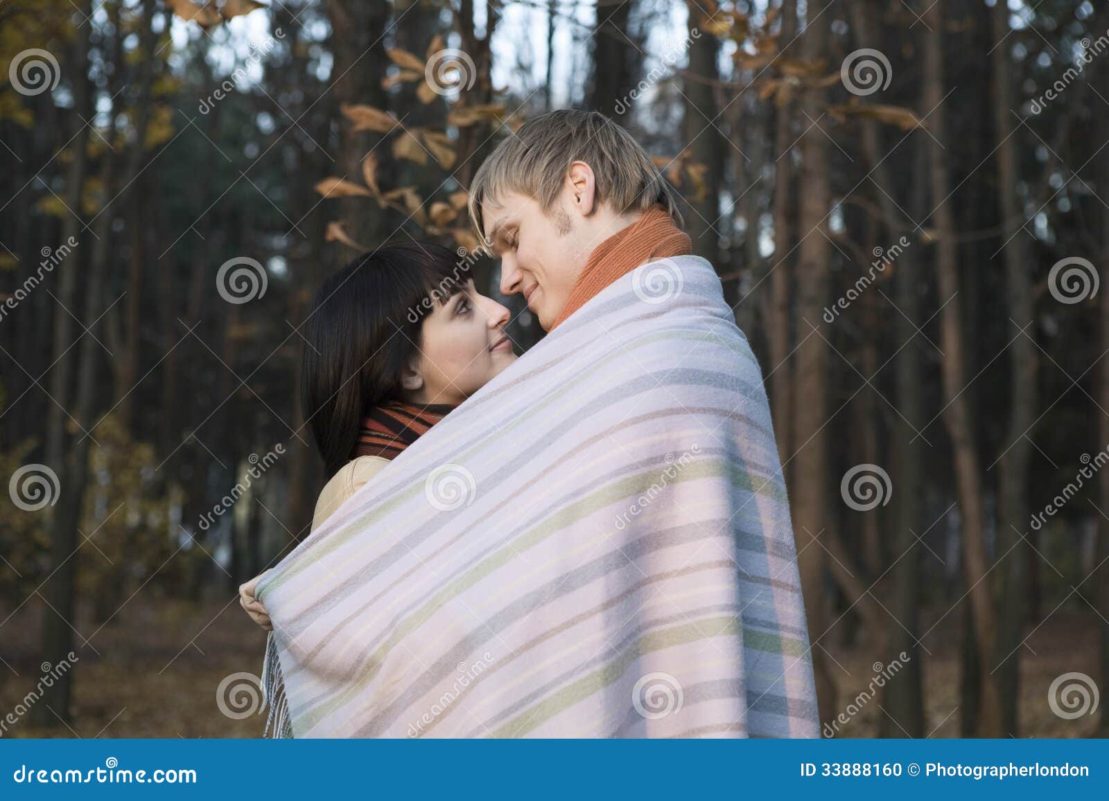 Couple Wrapped in Blanket Outdoors Stock Photo Image of affectionate