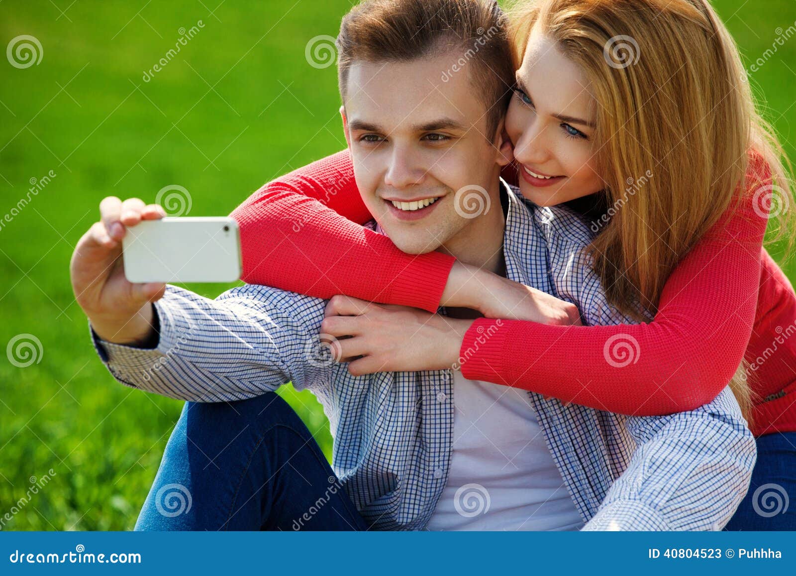 Couples With Phone Taking Selfie Self Portrait At The Park Stock Image