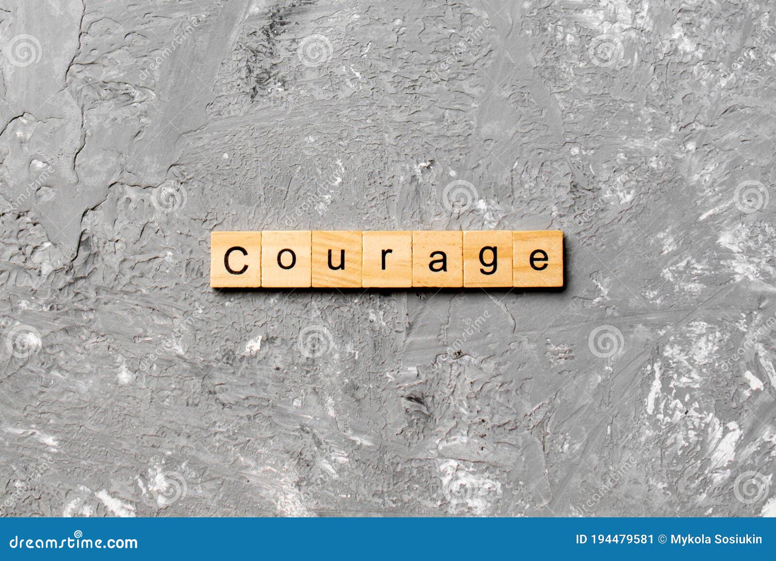 Courage Word Written on Wood Block. Courage Text on Cement Table for ...