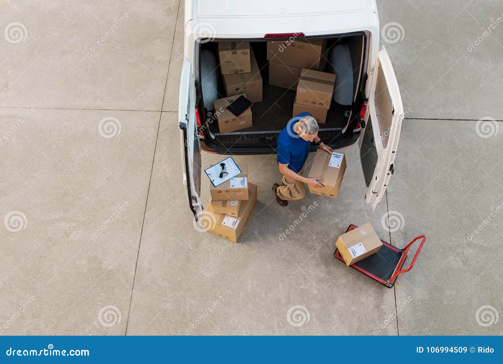 Courier delivering parcel stock image. Image of transport 106994509