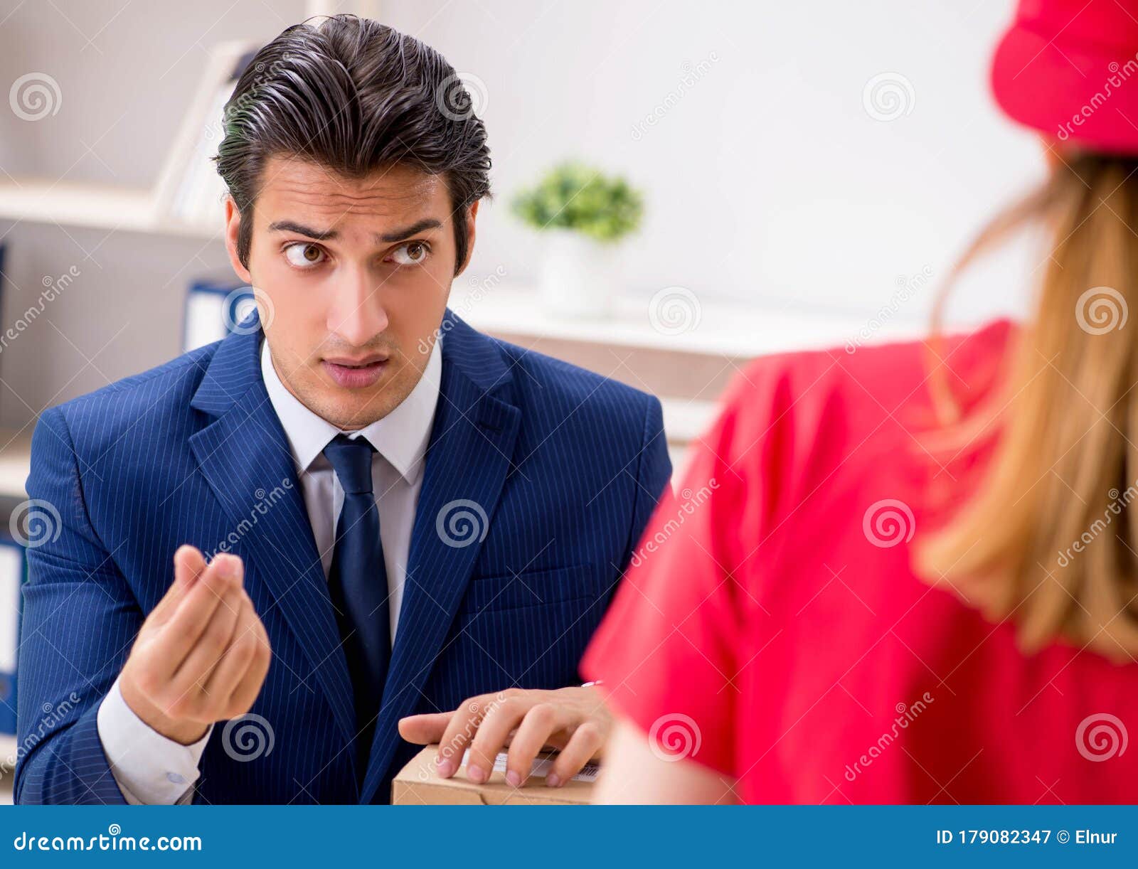 Courier Delivering Parcel To the Office Stock Image Image of office, business 179082347