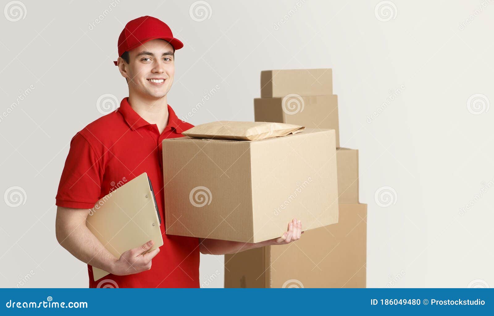 Courier and Package in Warehouse. Deliveryman Holding Box and Tablet