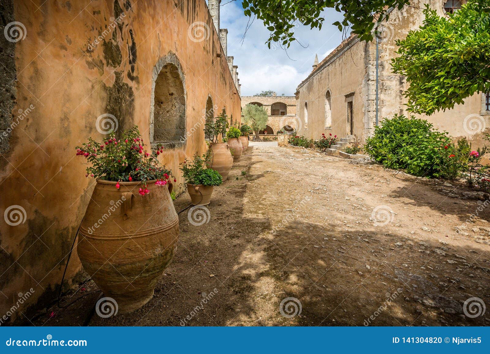 Courtyard of the Arkadi Monastery with Large Flower Pots in Crete
