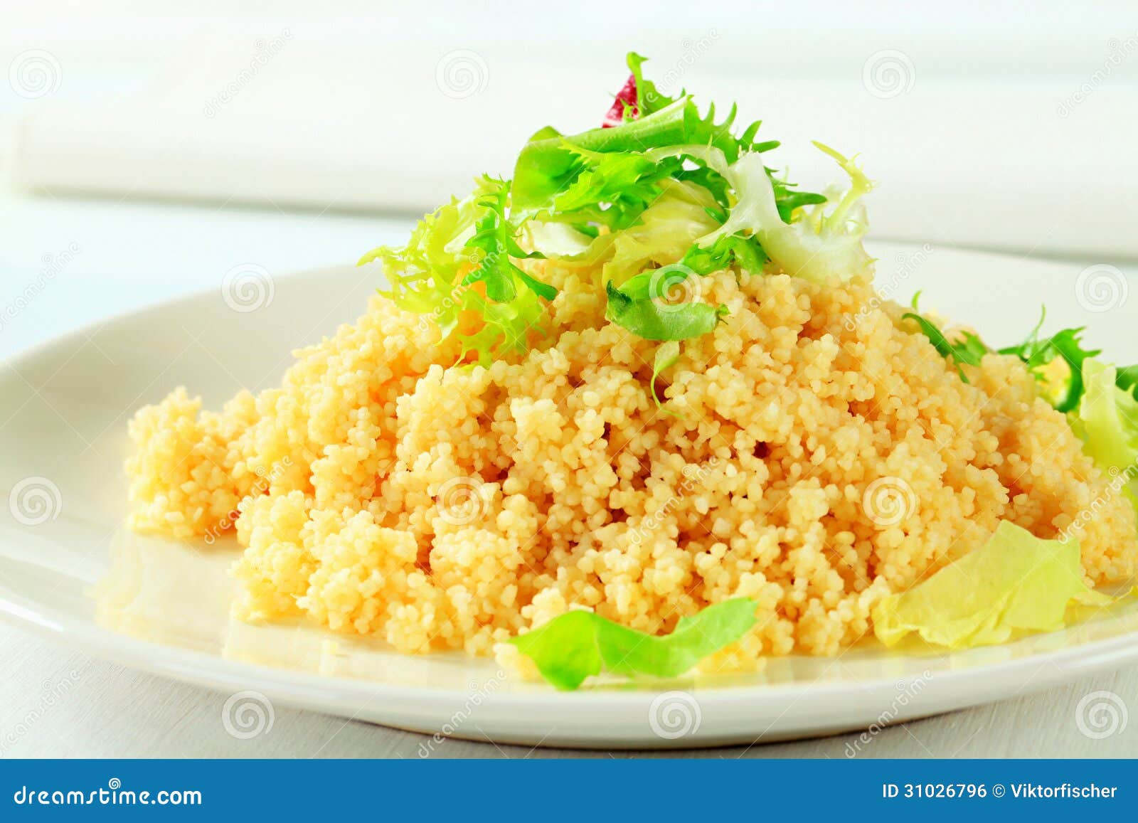 Couscous with salad greens stock photo. Image of rocket 31026796