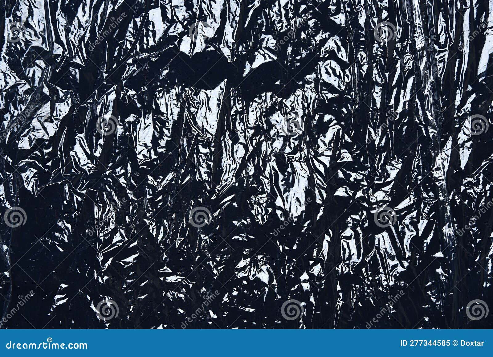 Cover Plastic Polyethylene Packaging on Black Background. Transparent