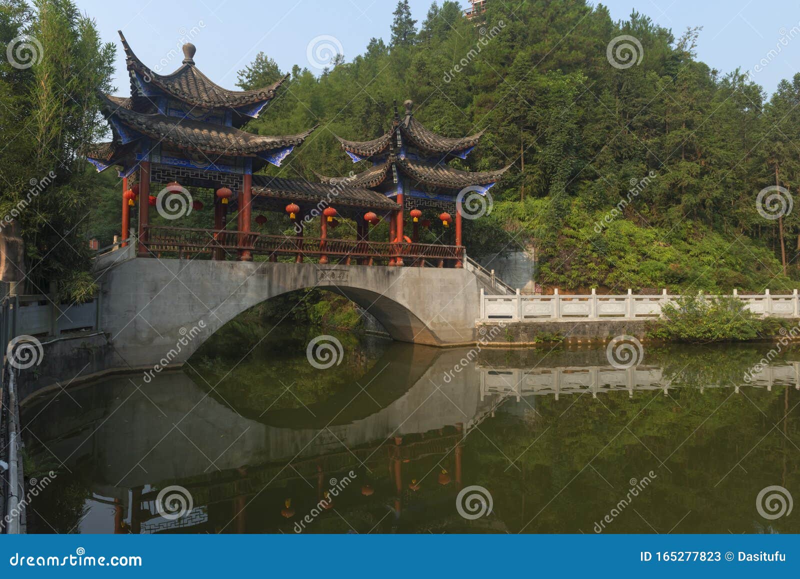 covered bridge with reflection at enshi, china