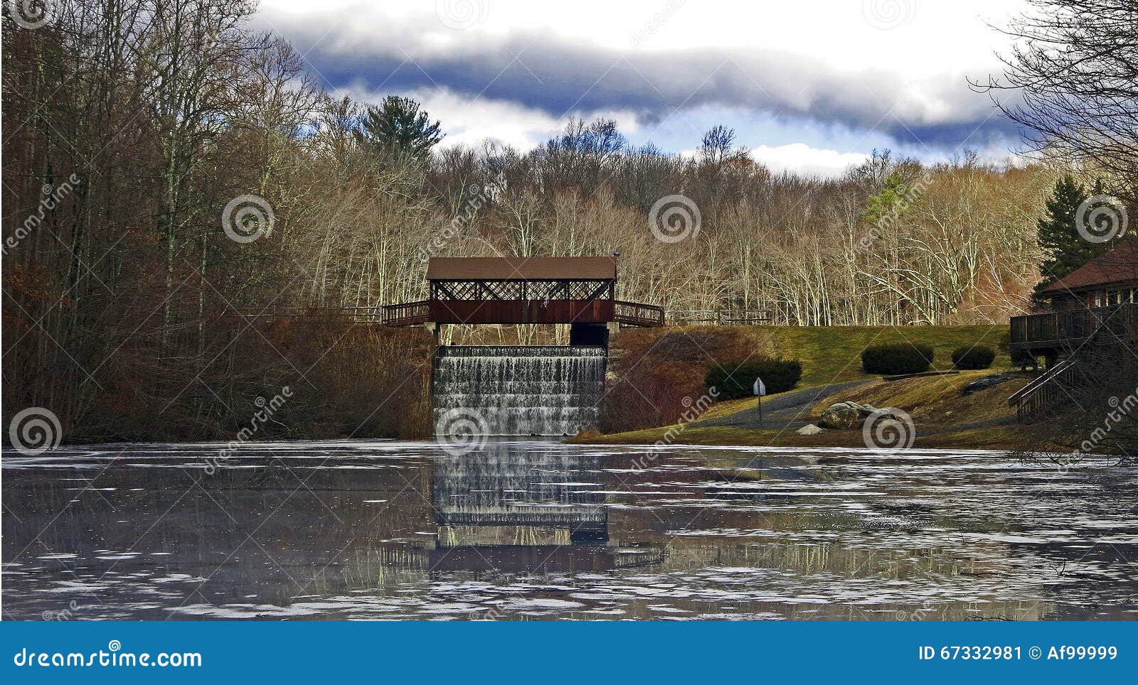 Covered Bridge And Waterfall With Reflecting Lake Stock Image Image