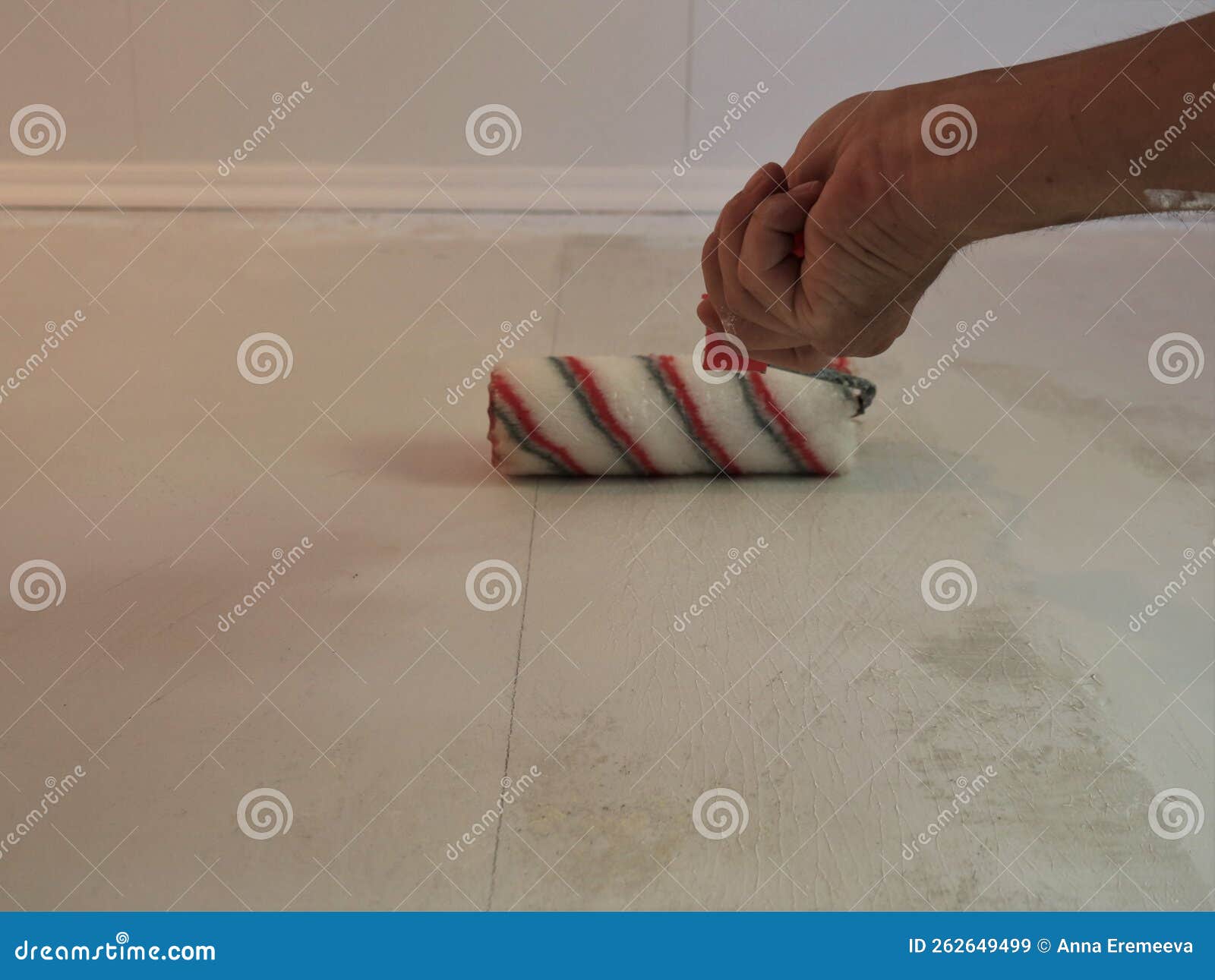 Covering the Wall with Glue Using a Roller Stock Image Image of hand