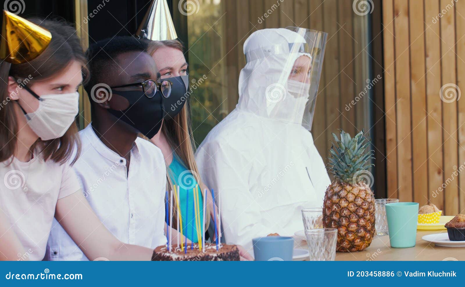 COVID-19 Birthday Party Celebration. Young Multiethnic Friends Share