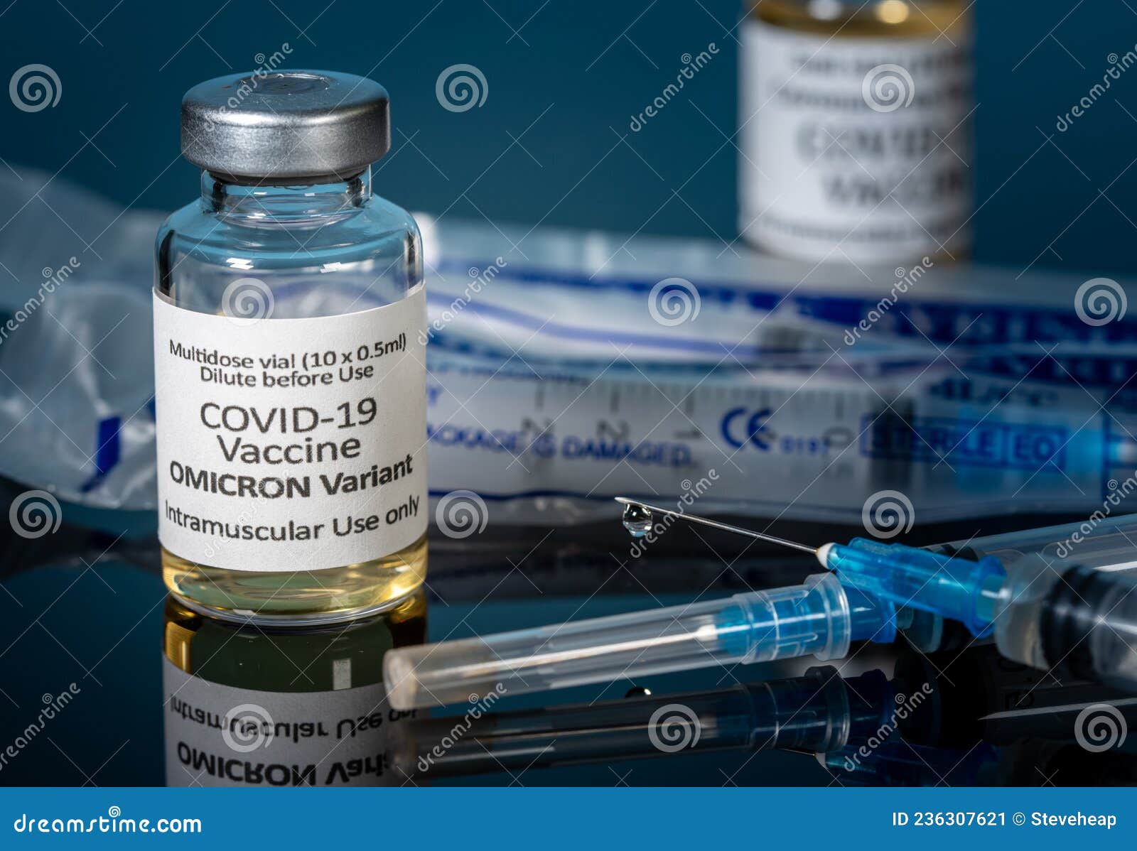 close up of bottle of new covid-19 vaccine for omicron variant