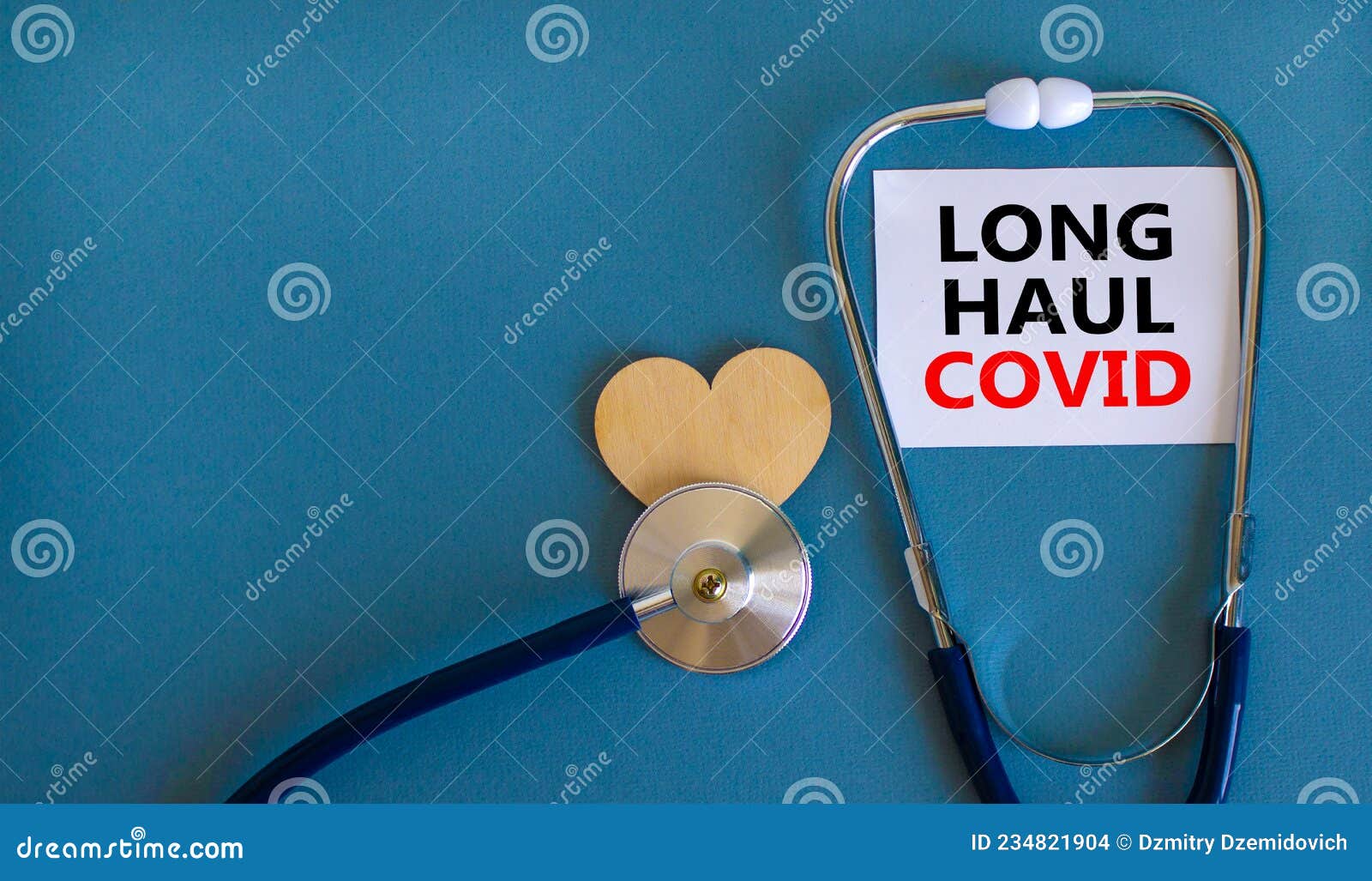 covid-19 long-haul covid symptoms . white card with words long haul covid. wooden heart, stethoscope, beautiful blue