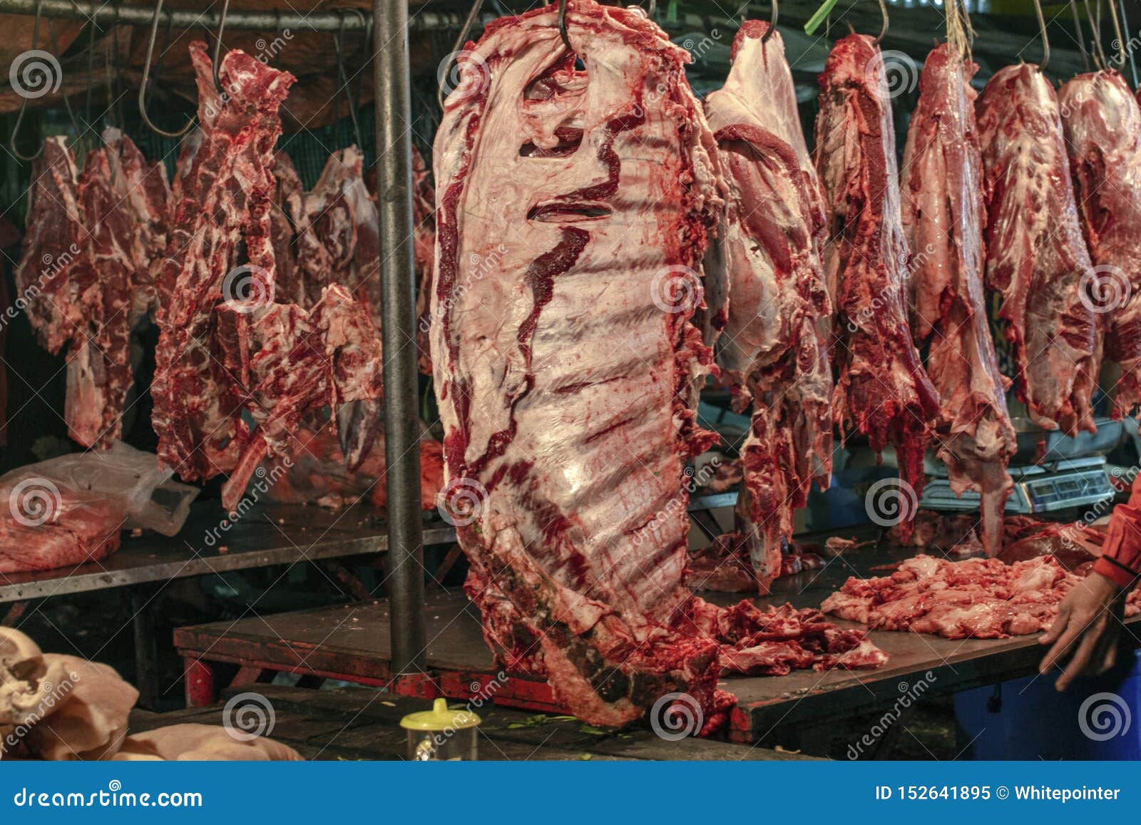 Cow Meat on the Hook Hanger in Traditional Market Stock Image