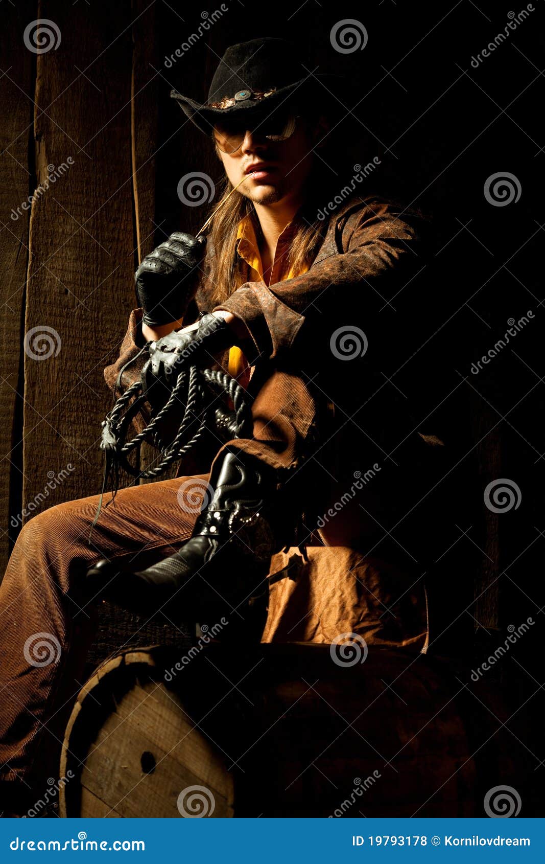 Cowboy with Black Leather Flogging Whip Stock Photo Image of