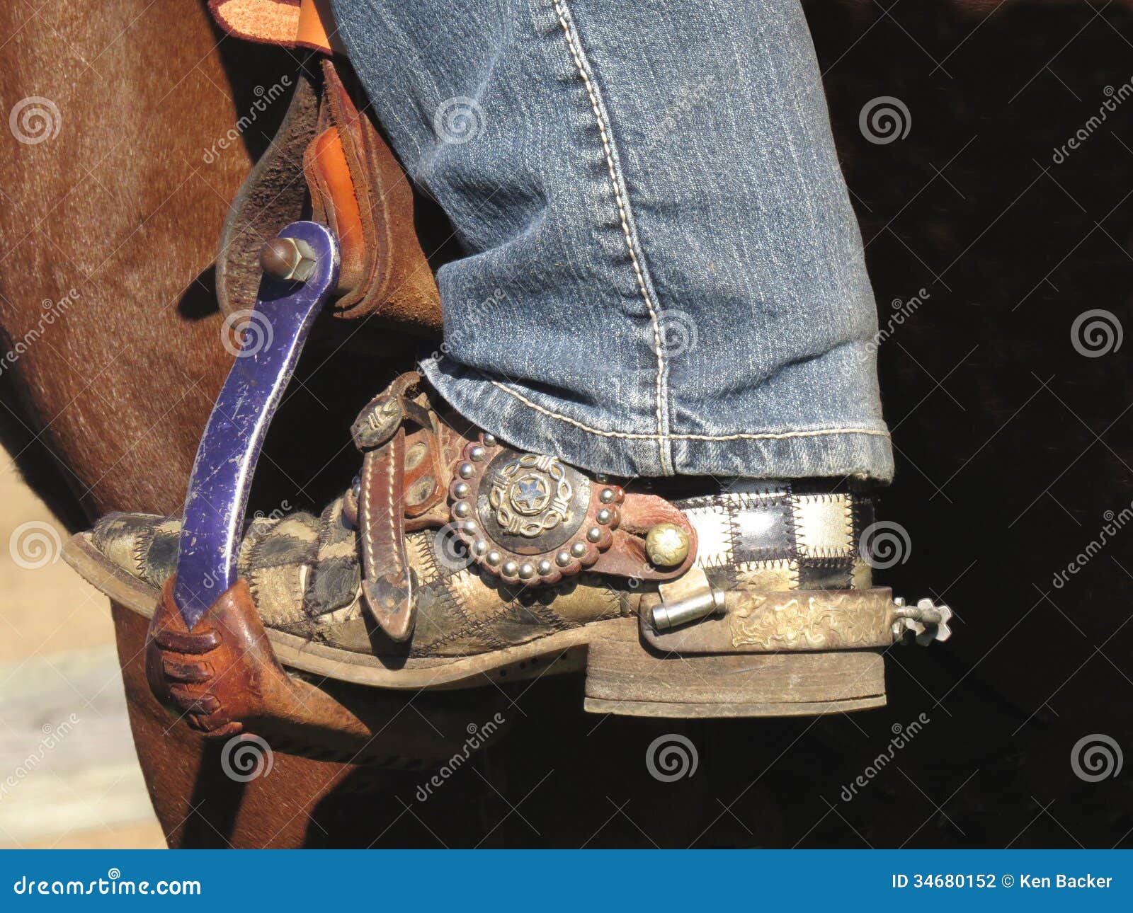 Cowboy Boot in Saddle Stirrup Stock Photo Image of denim, boots 34680152