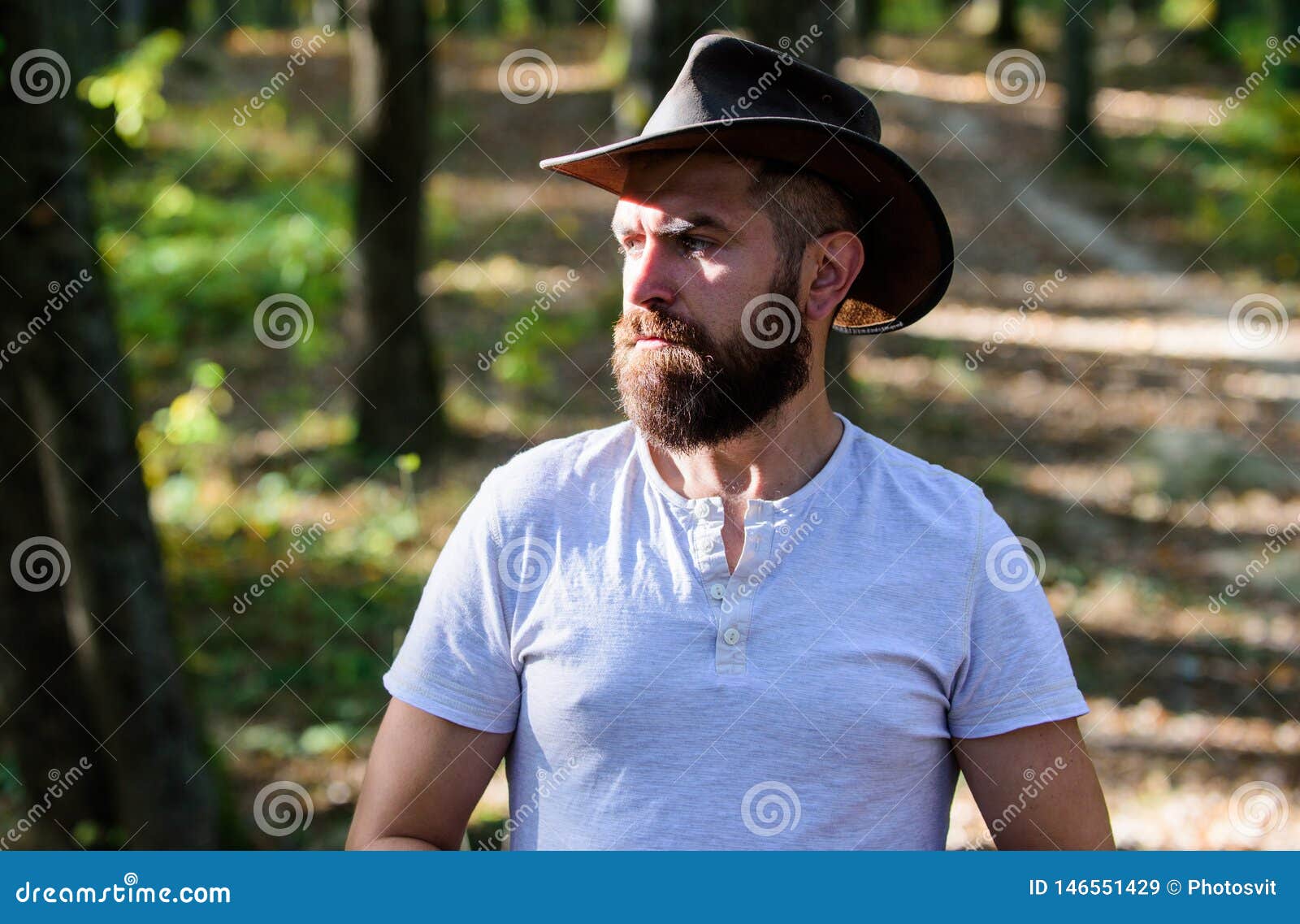 Cowboy Couture. Bearded Man in Cowboy Hat Walk in Park Outdoor. Man ...