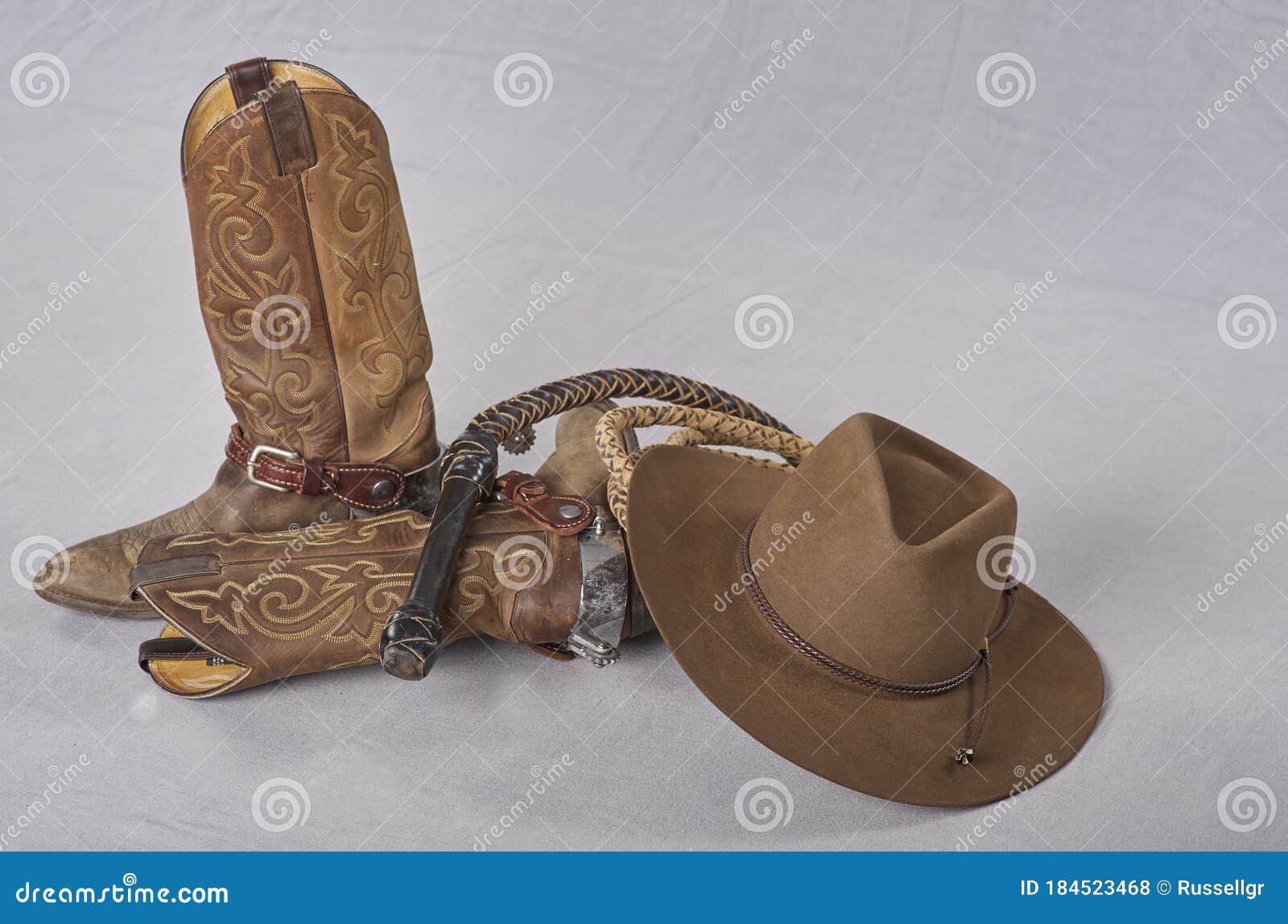cowboy gear boots, hat, spurs, whip