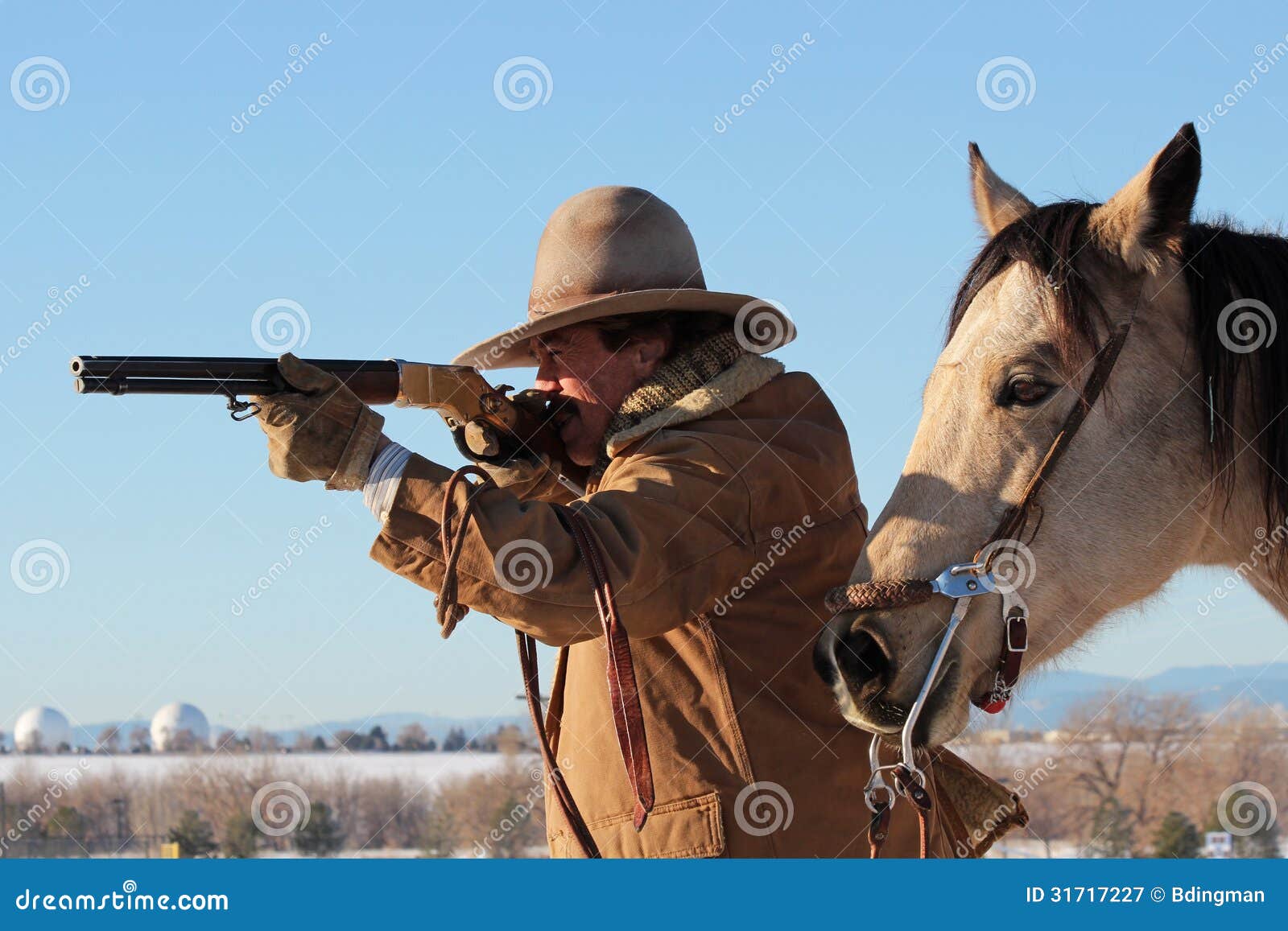 cowboy with a rifle