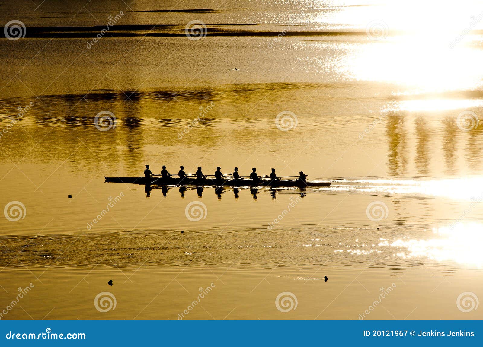 rowing crew at sunrise