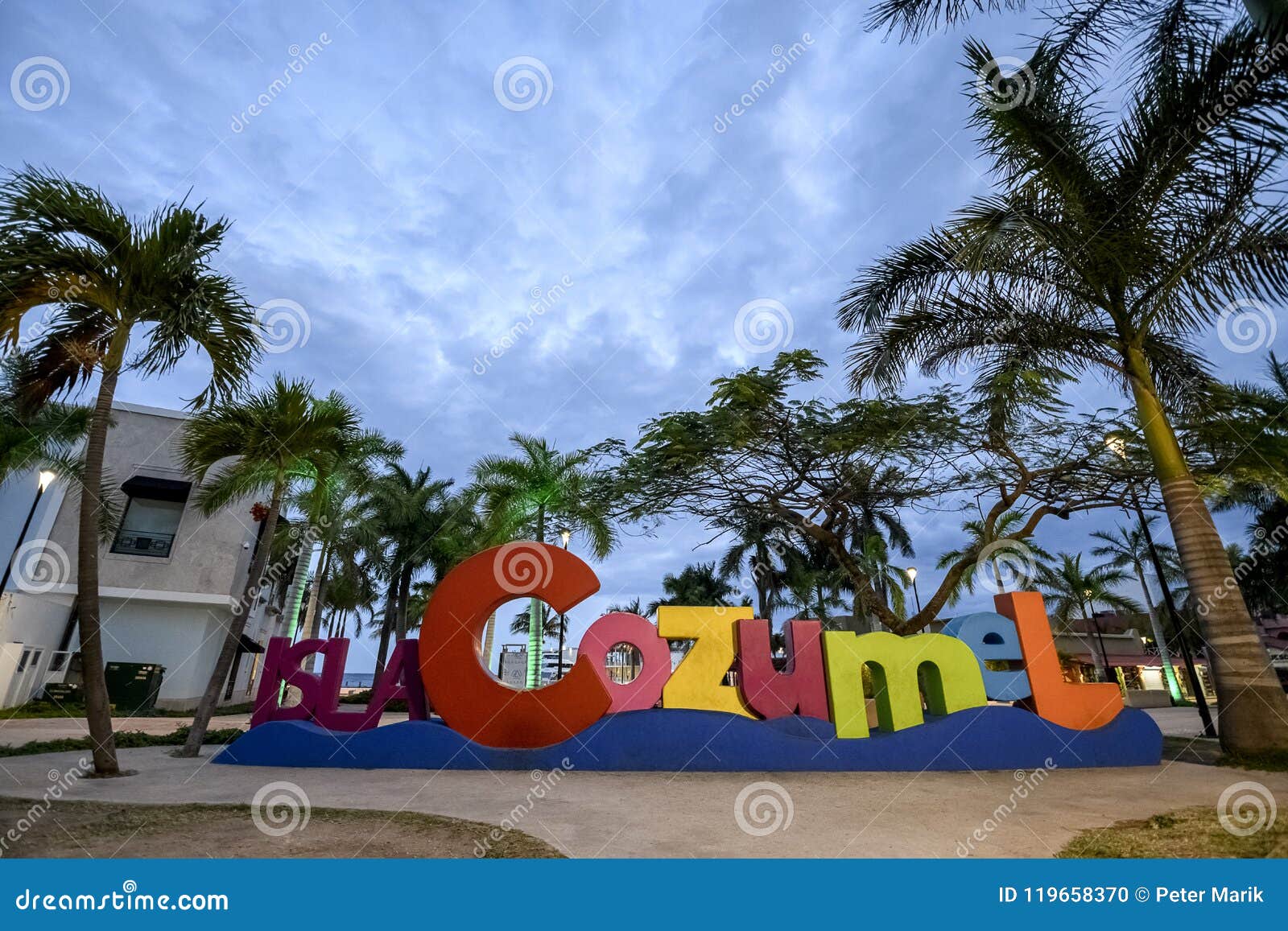 the cozumel selfie sign at dusk on the main square of the island