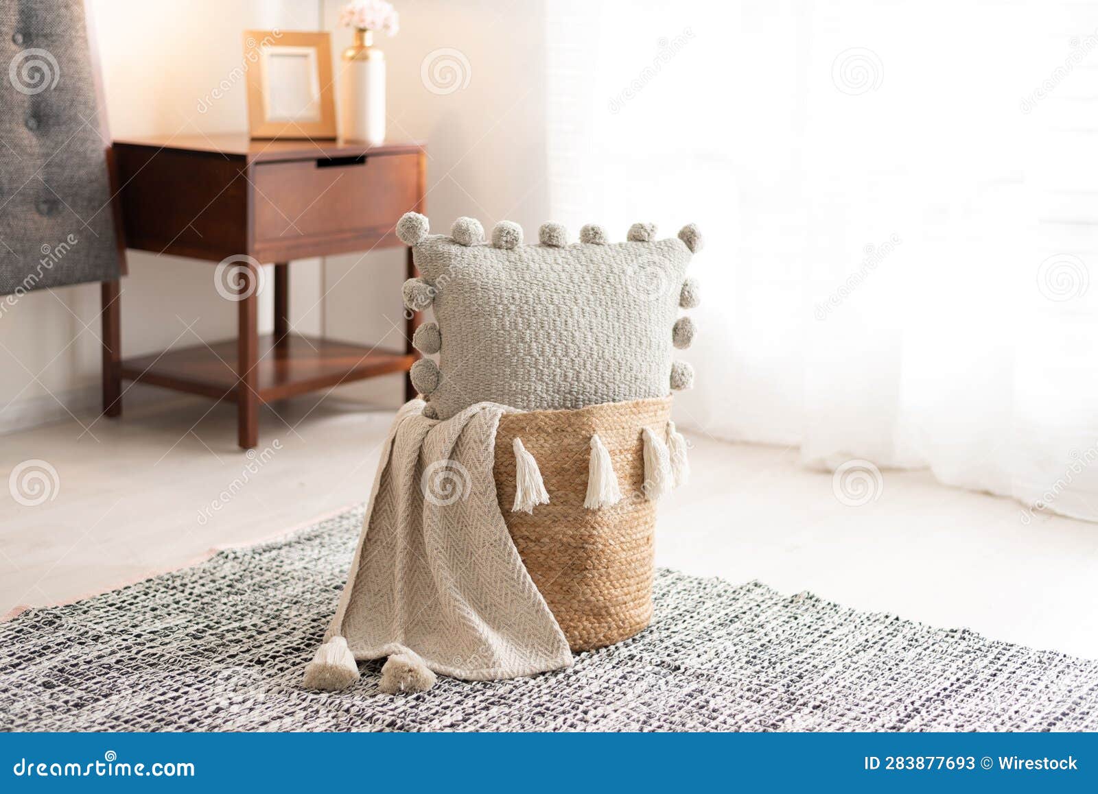 Cozy Bedroom Featuring a Bed Adorned with a Selection of Lightcolored
