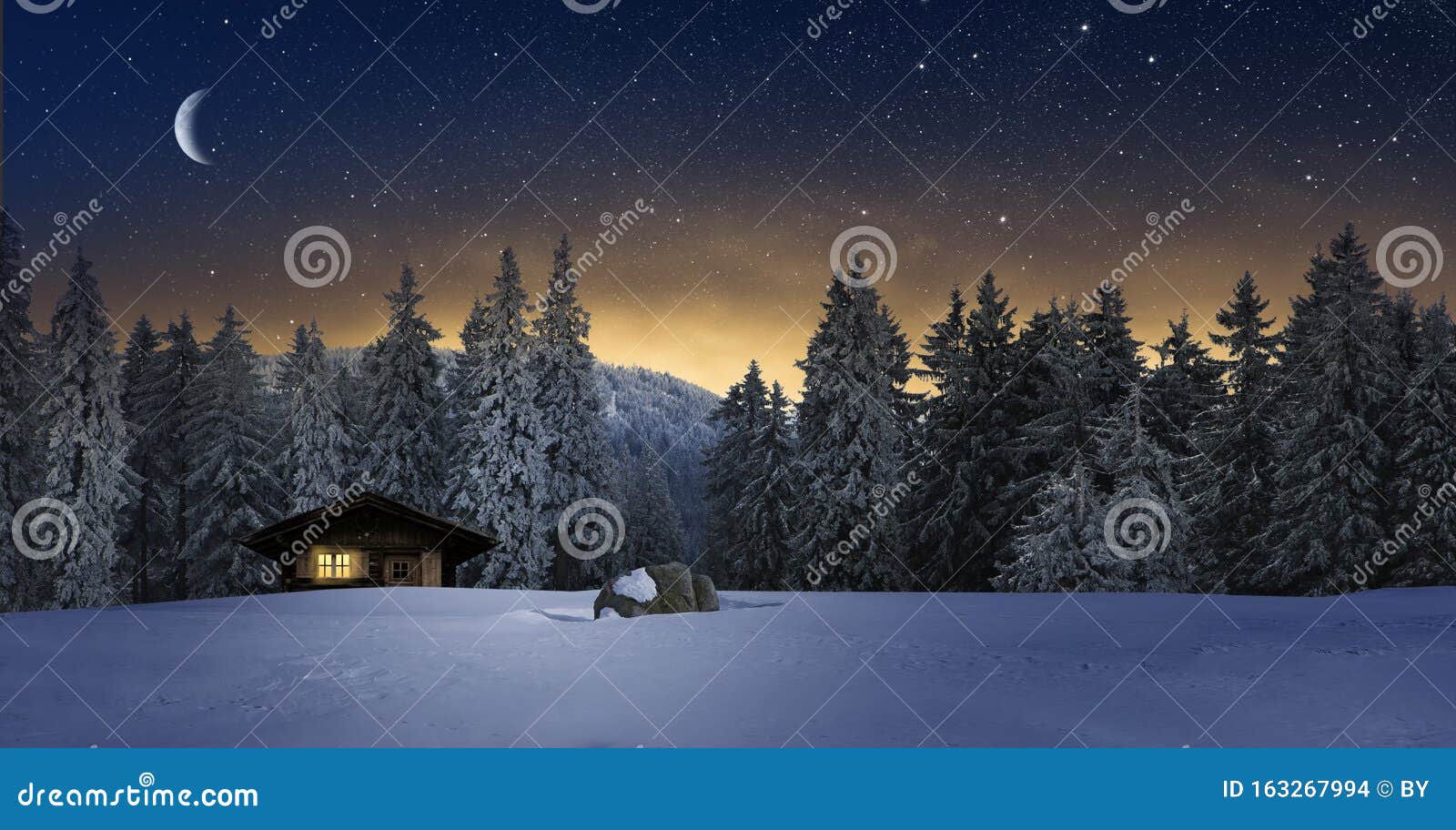 cozy cottage in wintertime at night