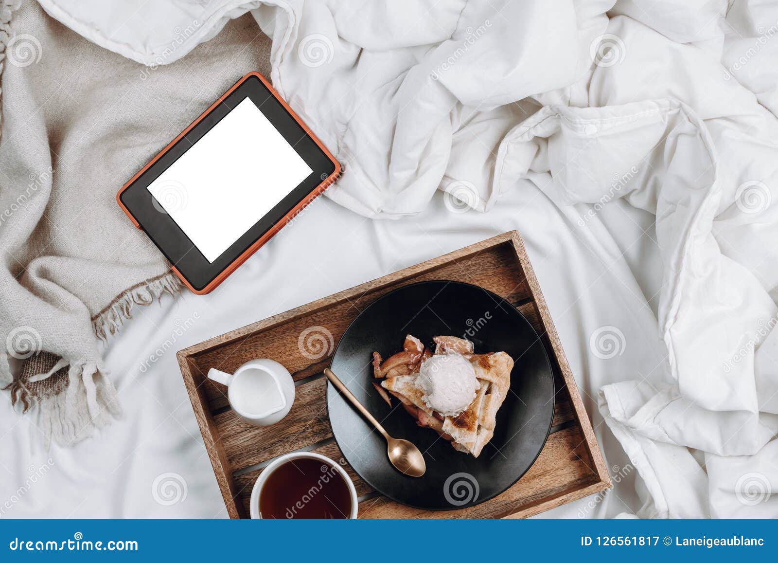 Cozy Flatlay Of Bed With Wooden Tray With Vegan Apple Pie Ice Cream