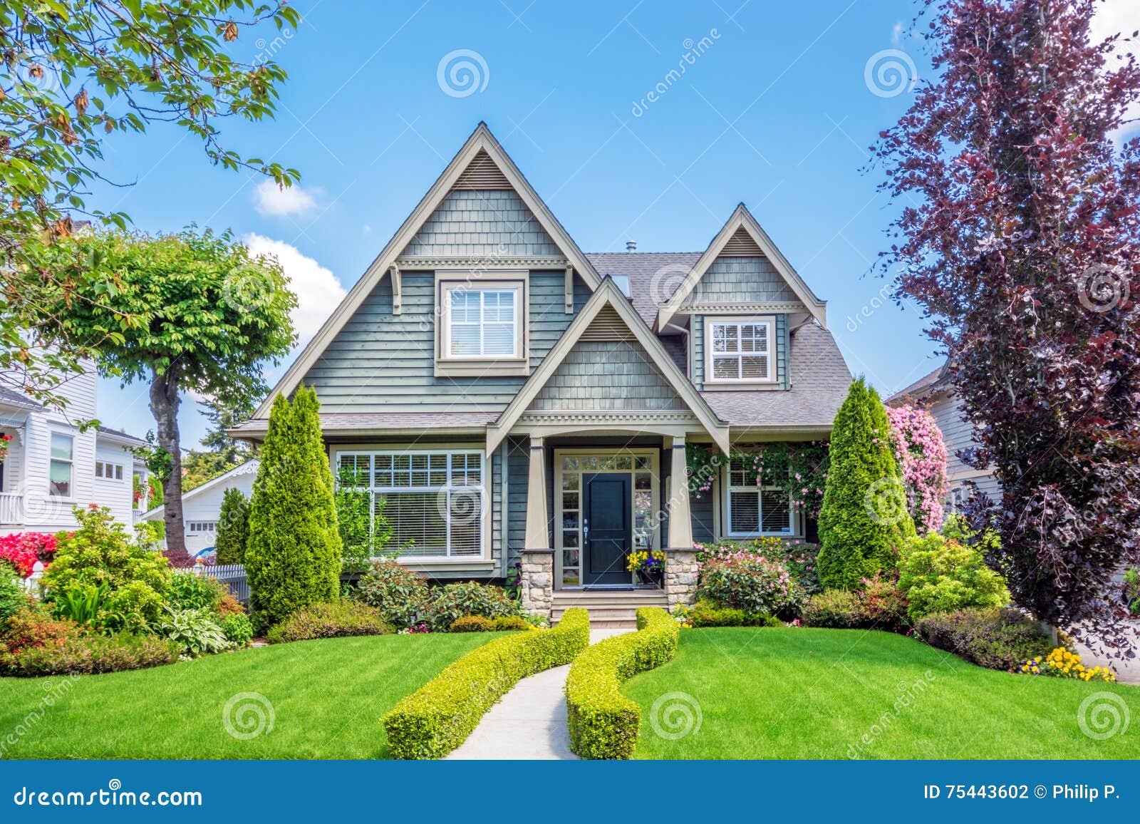 cozy house with beautiful landscaping