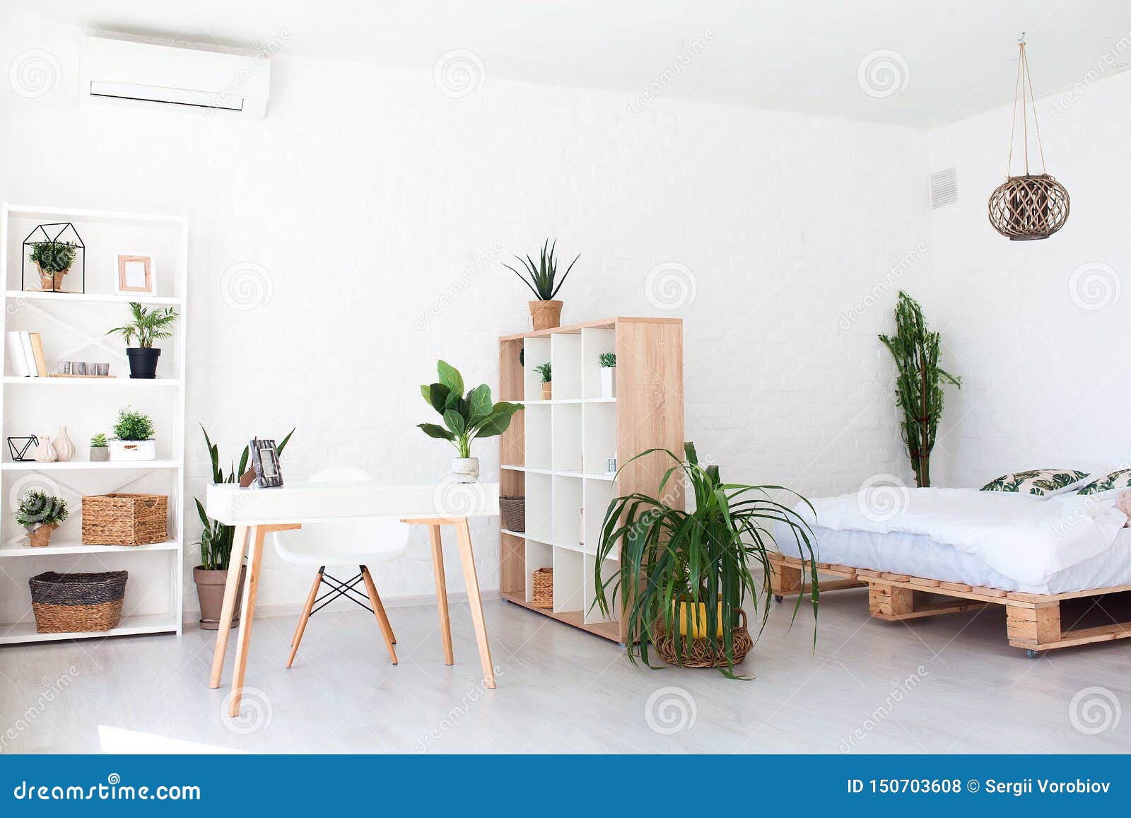 Cozy Interior Design Of Modern Studio Apartment In Scandinavian Style. A  Spacious Huge Room In Light Colors With Wooden Stock Photo - Image Of  Light, Luxury: 150703608