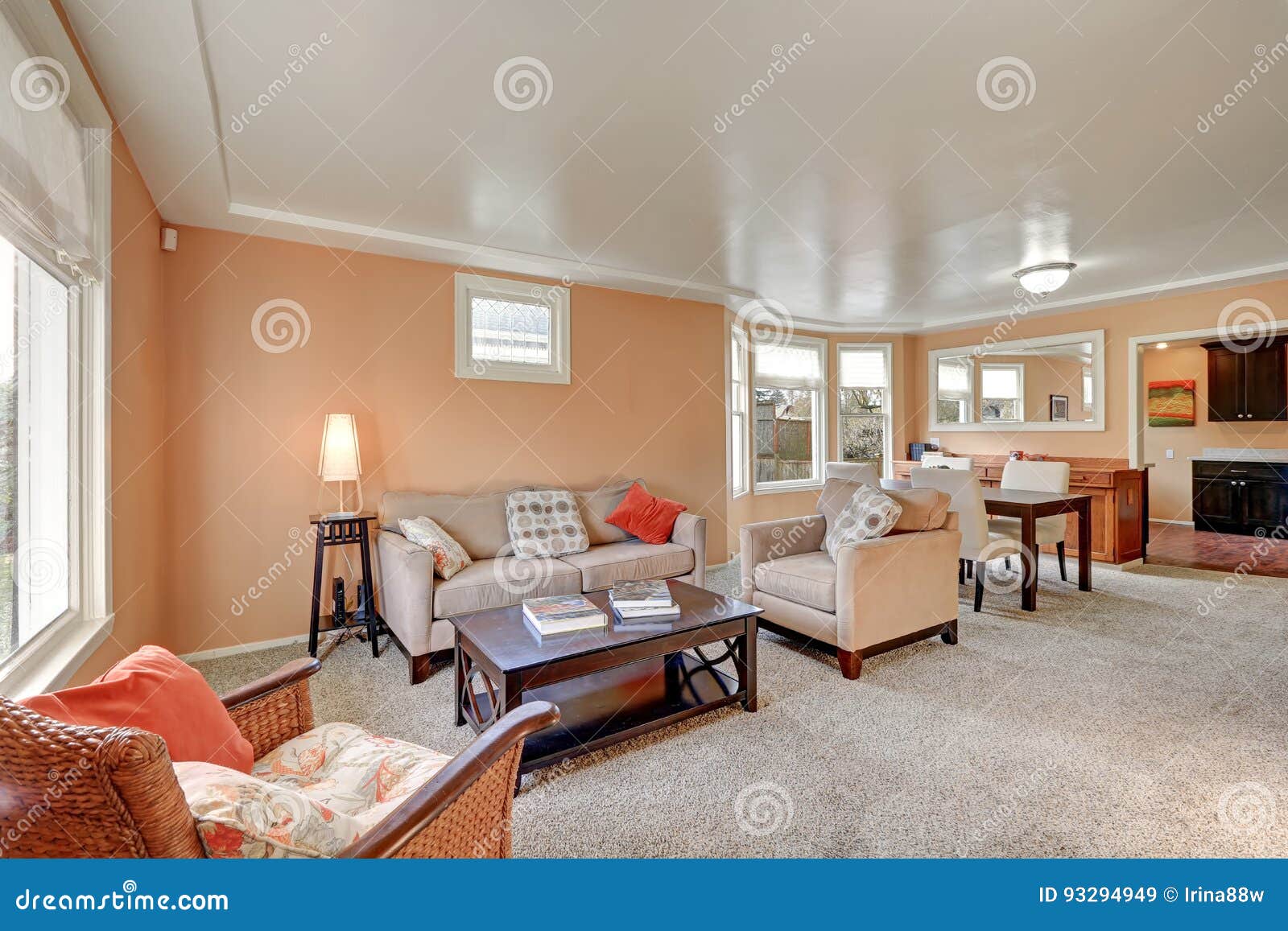 Cozy Living And Dining Room Interior With Peach Walls Stock