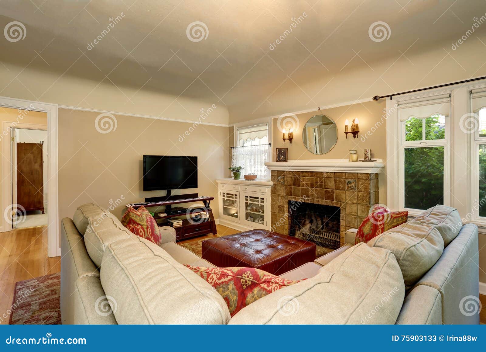 Cozy Living Room Interior With Brick Fireplace Tv Set And Beige