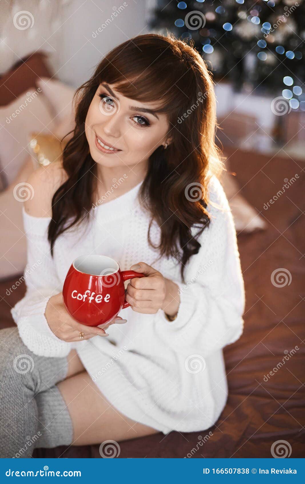 Cozy Portrait of Beautiful and Girl with Dark Hair, Bright Makeup and