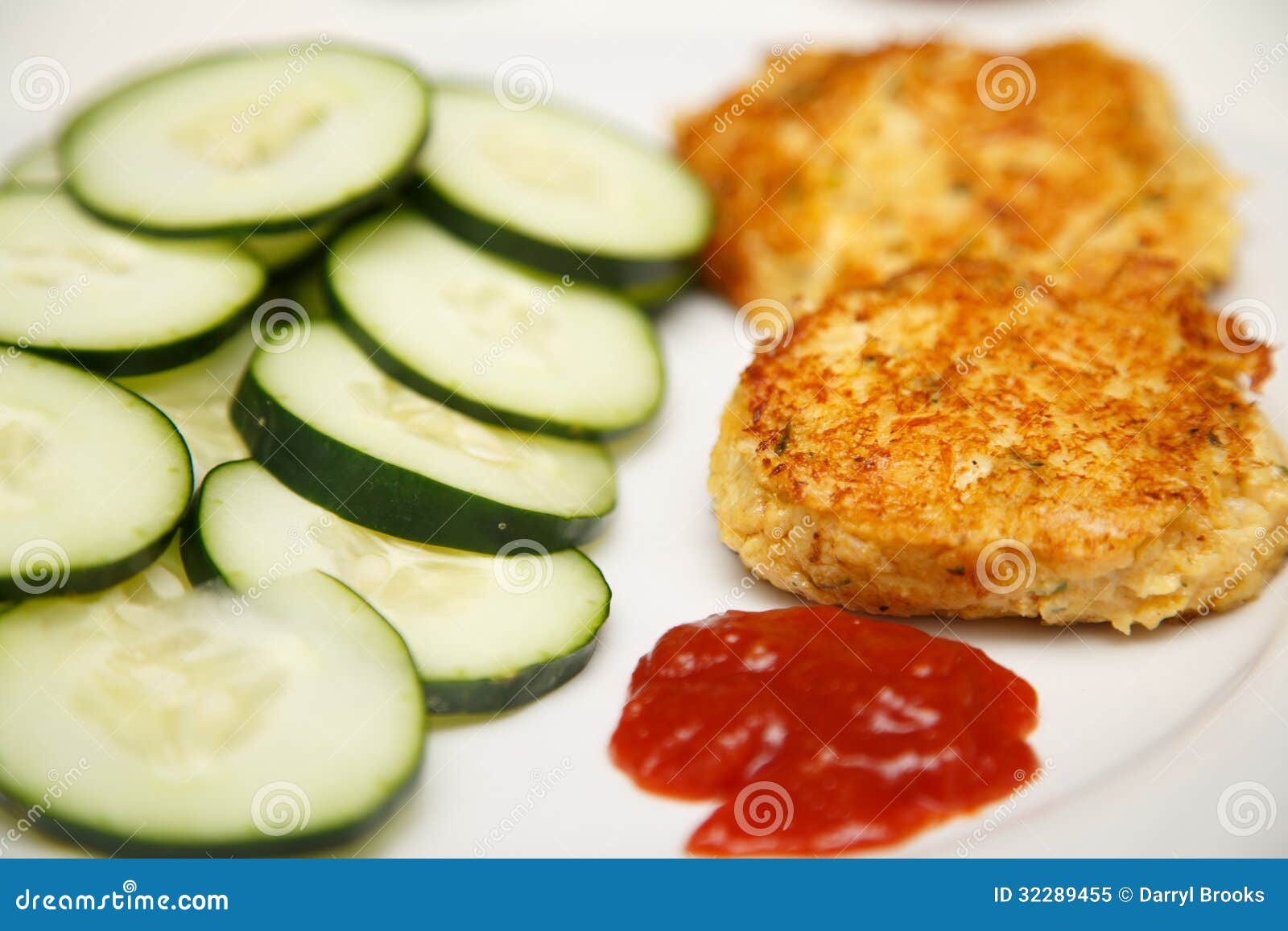 Crab Cakes with Sliced Cucumbers and Cocktail Sauce Stock Image Image