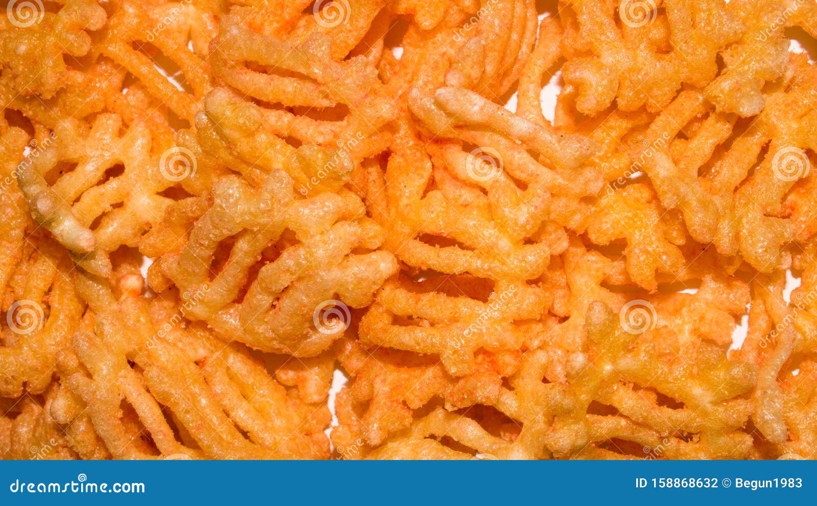 Background of Crab Chips.Crab Chips in the Form of Crabs. Stock Photo