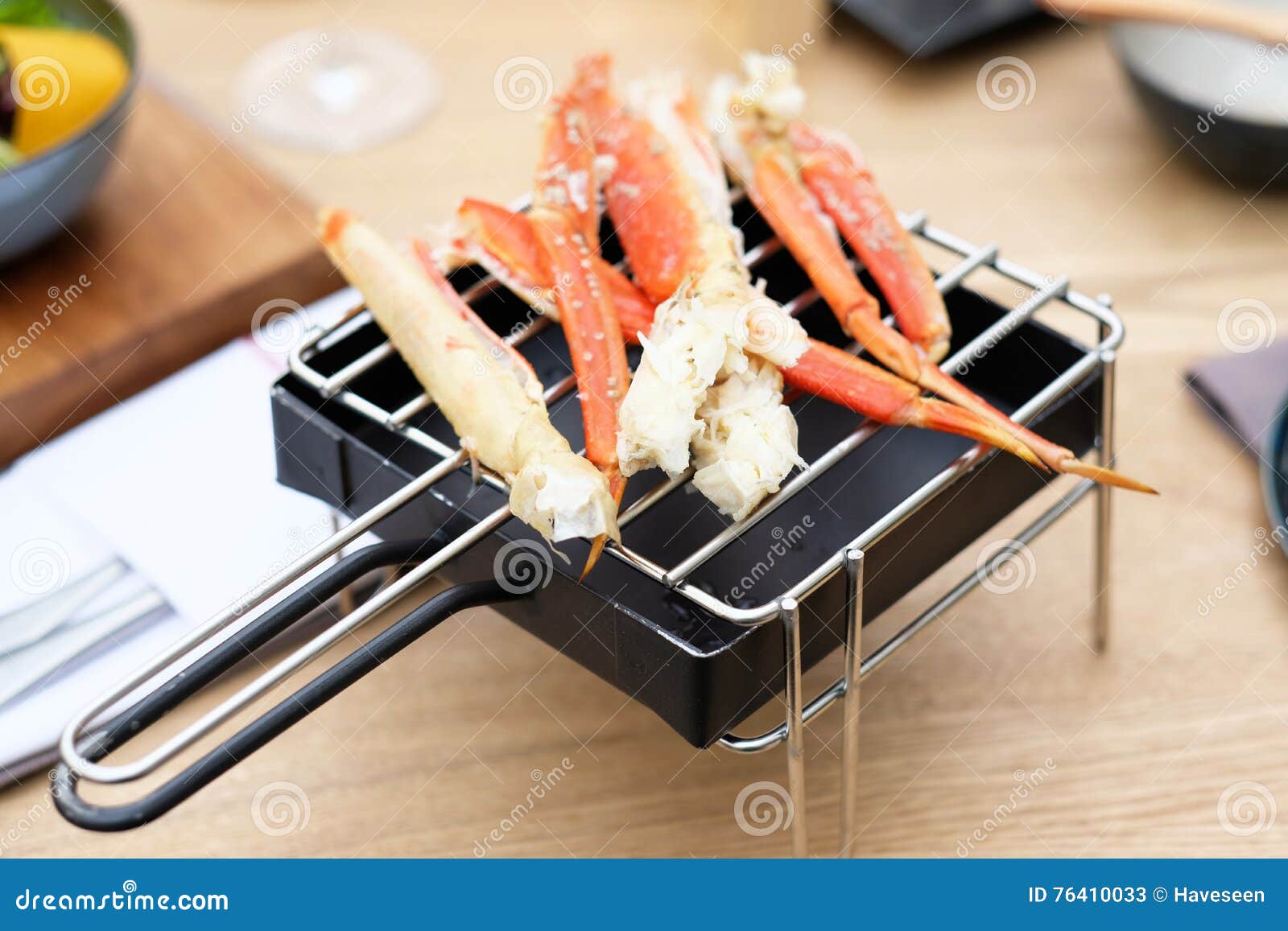 Crab legs in restaurant stock image. Image of restaurant 76410033