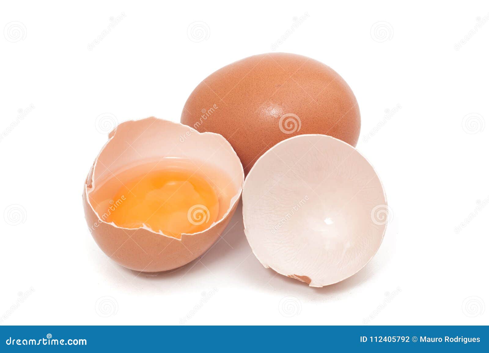 Cracked egg with yolk stock photo. Image of broken, cracked 112405792