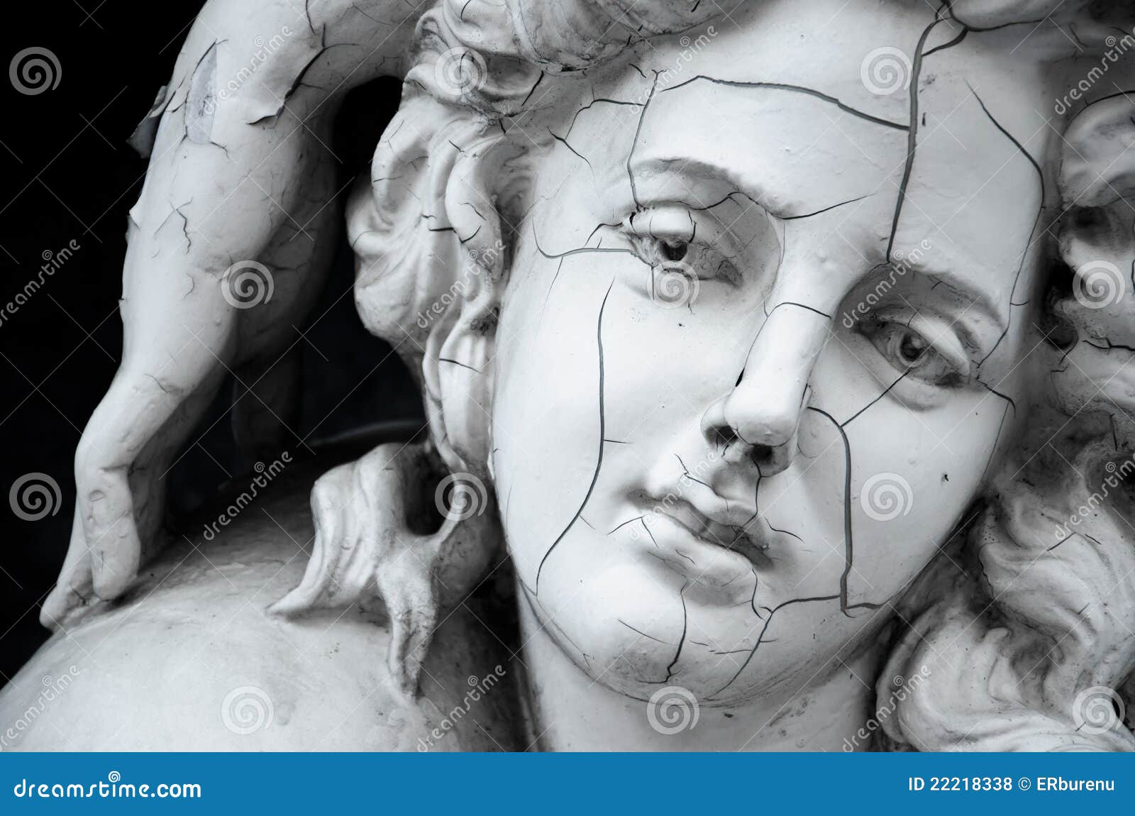 cracked face of female greek sculpture