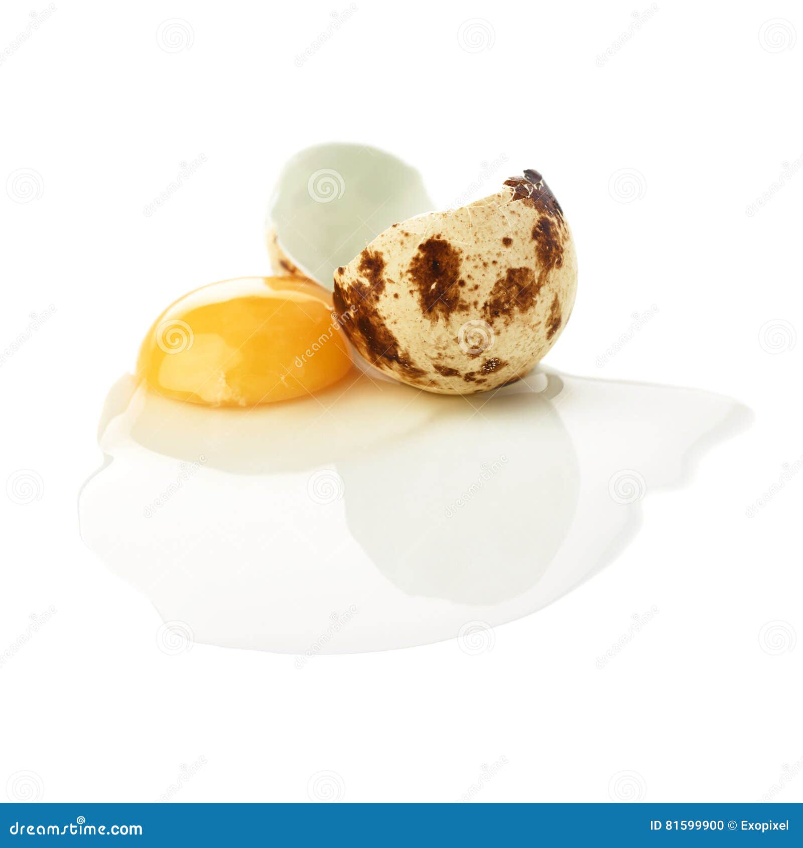 Cracked Raw Quail Egg With Yolk Isolated Over White Background Stock