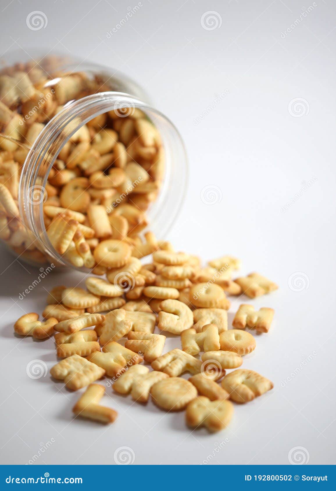 Cracker or Cookie ABC Letter Alphabet in Glass with Copy Space on White