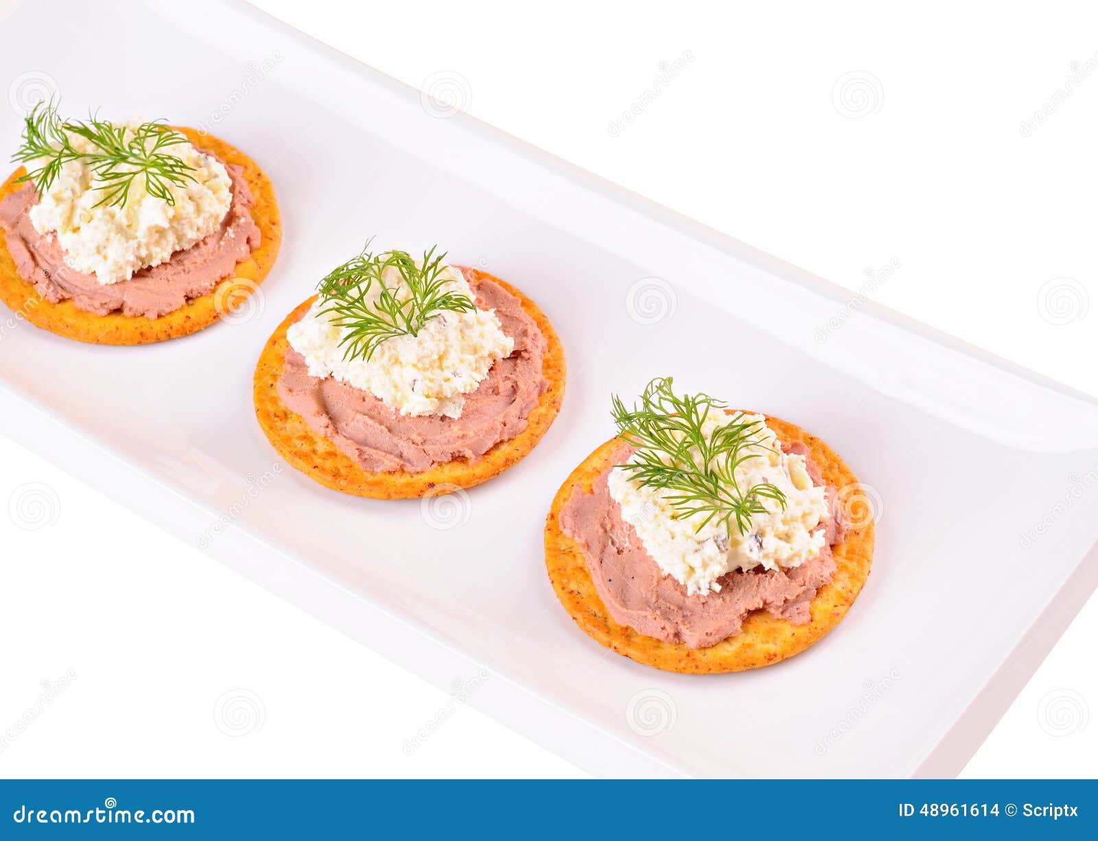 Crackers with Pate, Cheese Cream and Dill on a Plate Stock Photo