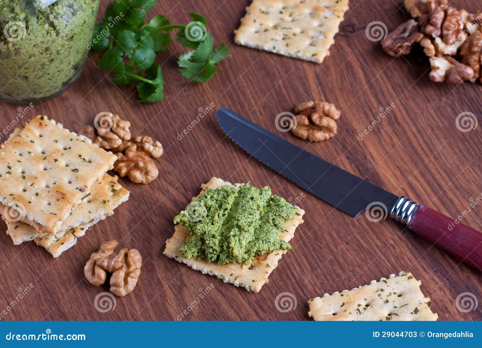 Crackers with walnut pesto stock image. Image of basil 29044703