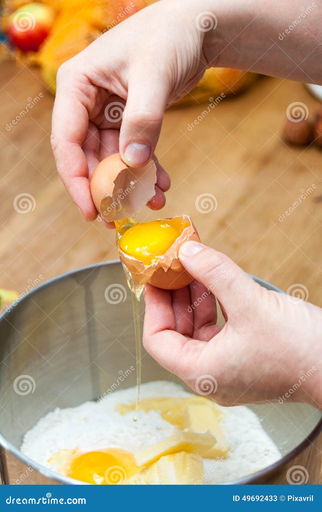 Cracking an egg stock image. Image of pastry, cooking 49692433