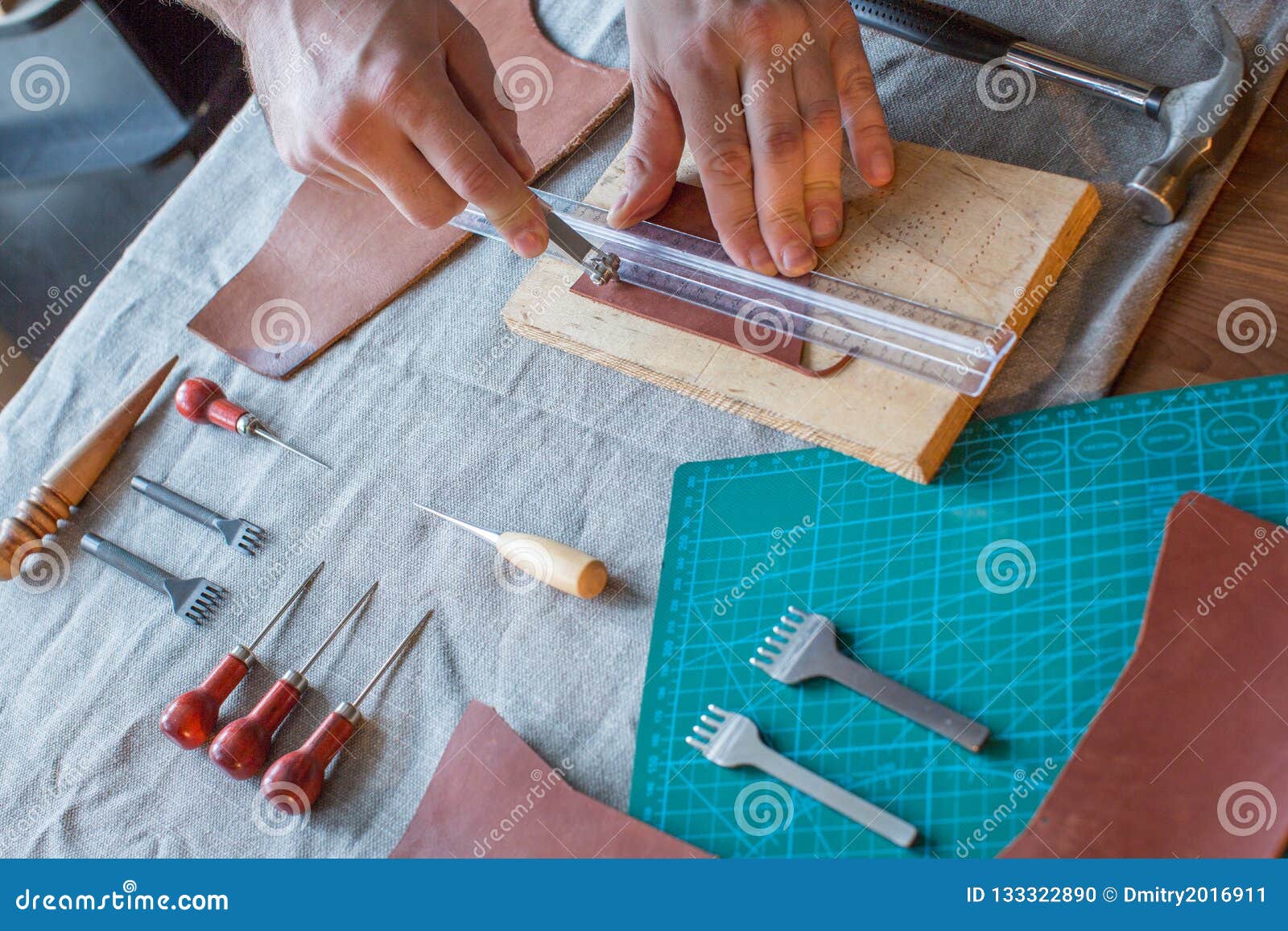 Craft Man is Working on His Leather Craft, Making Vintage Leather Bag