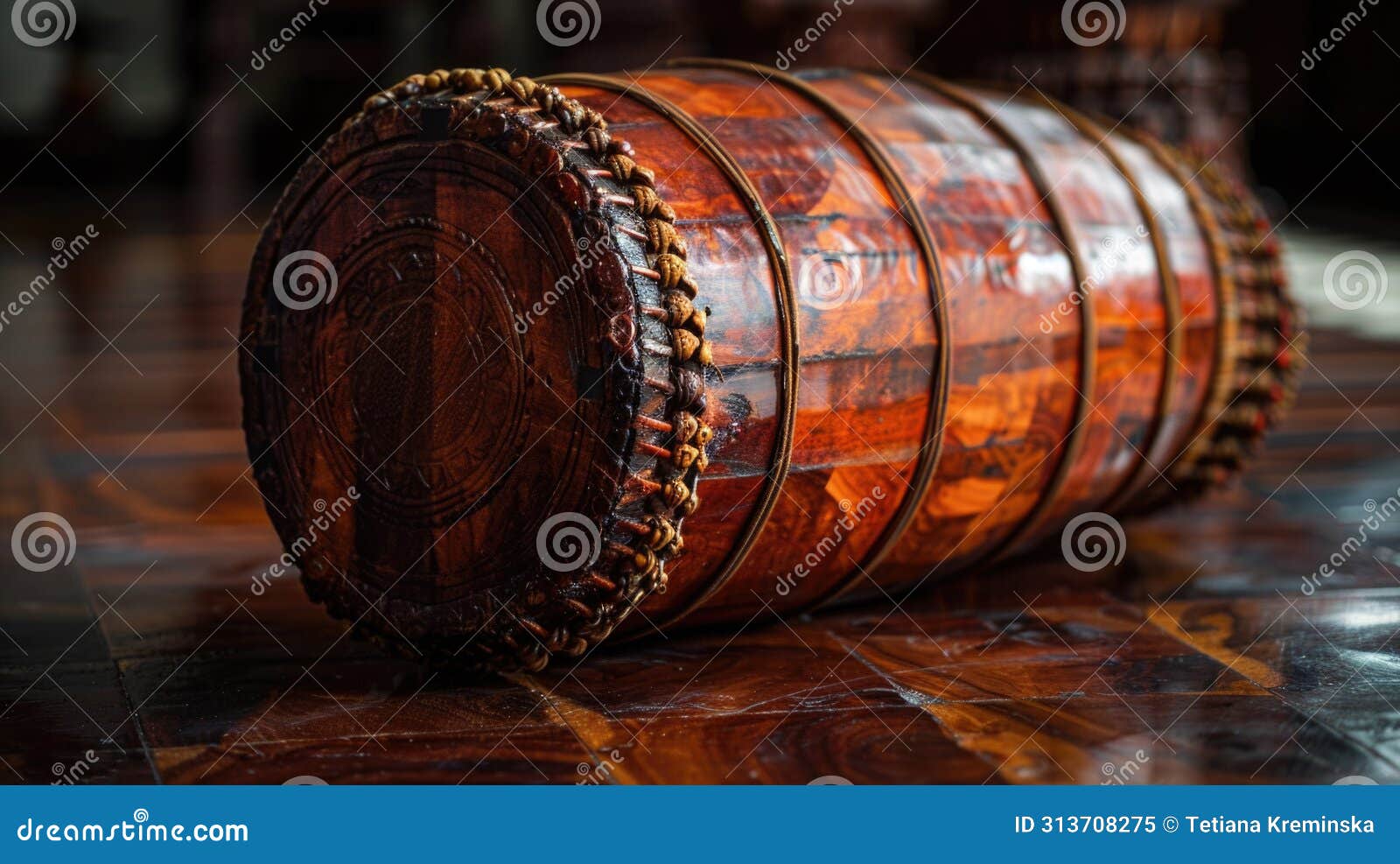a crafted wooden "raban" drum, a traditional instrument used during sinhalese new year celebrations. the drum is