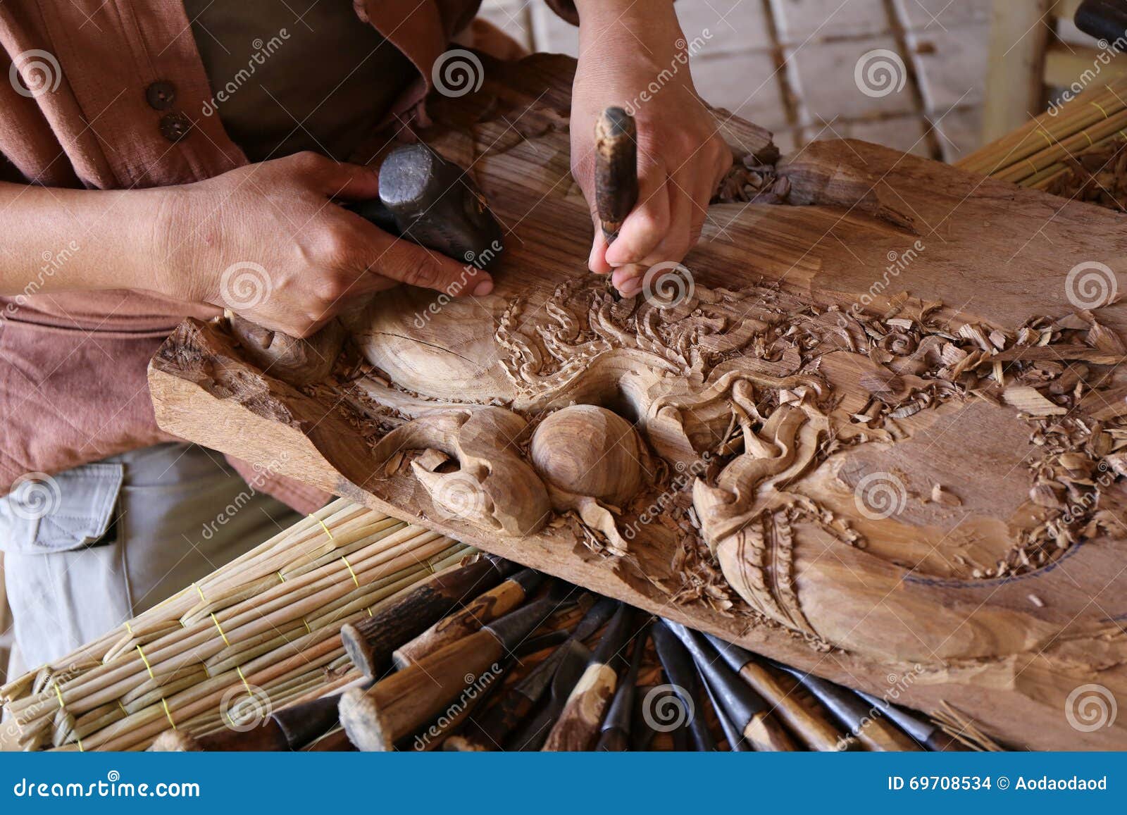 Craftsman carving wood stock photo. Image of 69708534