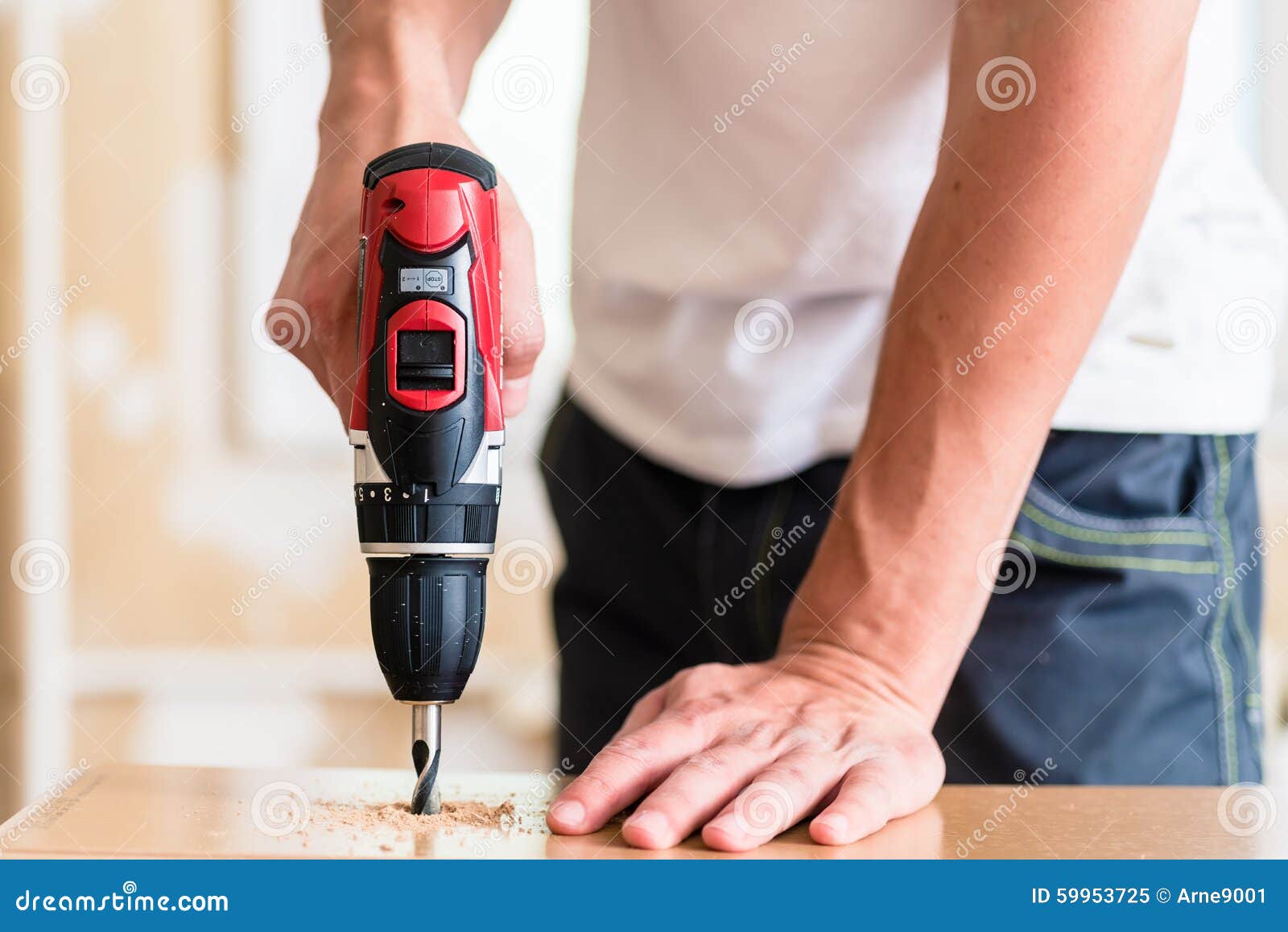 craftsman or diy man working with power drill