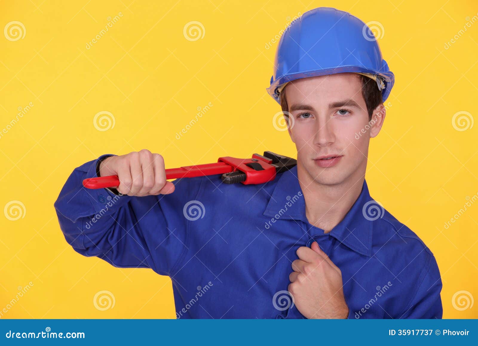 Craftsman Holding a Spanner Stock Image Image of industrial, service