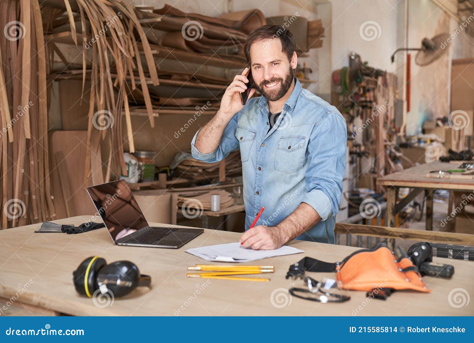 Craftsman On The Phone With Customer Advice Stock Photo Image Of craftsman-on-the-phone-with-customer-advice-stock-photo-image-of